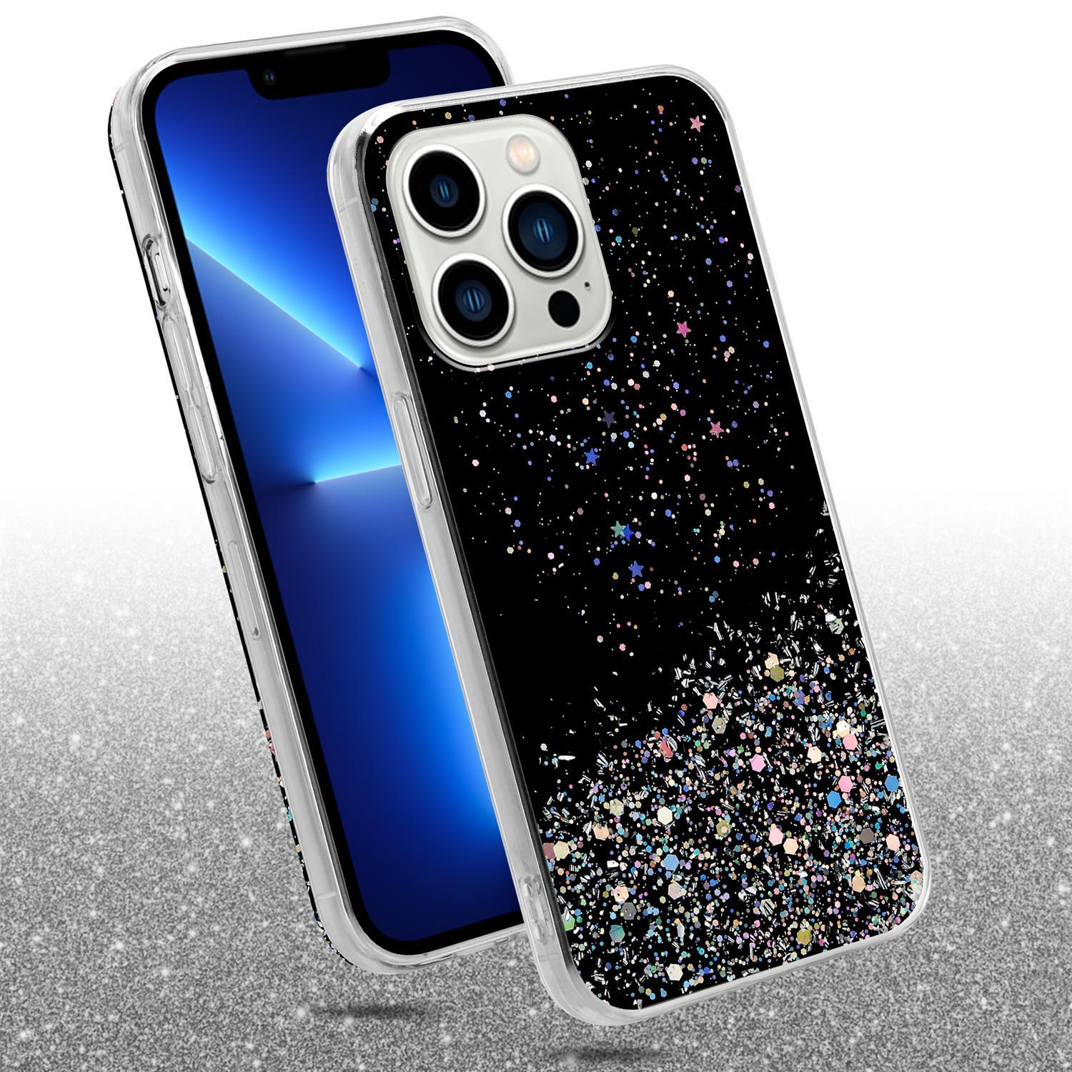 Ein Telefon auf einer schwarzen Hülle mit glänzendem Glitzer. Das Telefon ist dezentriert. Der Hintergrund ist schimmerndes Silber.