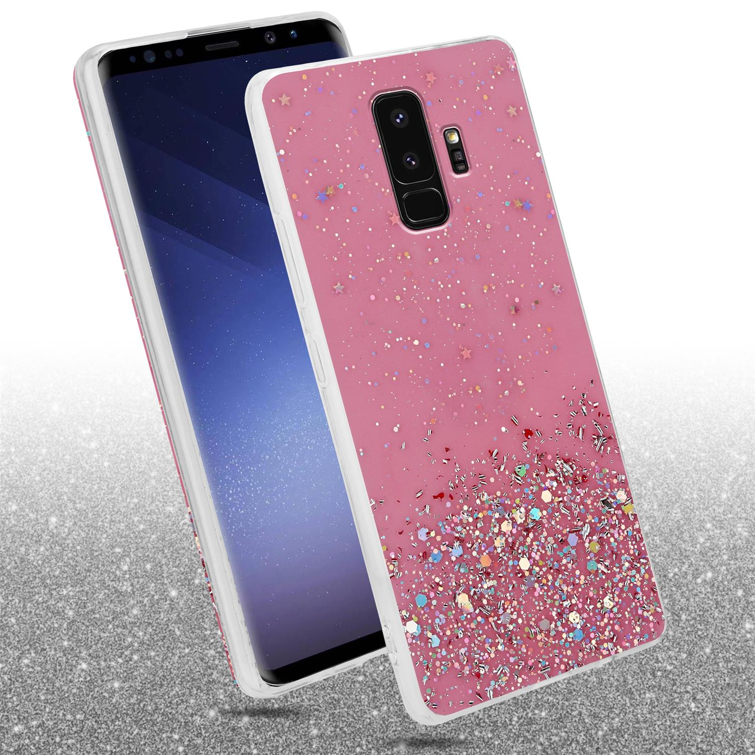 Rosa Handyhülle mit Glitzer und Sternen, neben dem Handy. Der Hintergrund ist glänzend.