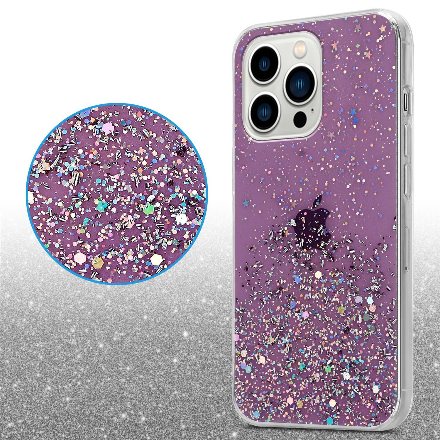 Lila Handyhülle mit Glitzer, Sternen und einem Apple-Logo. Die Hülle liegt auf einer glitzernden Oberfläche.