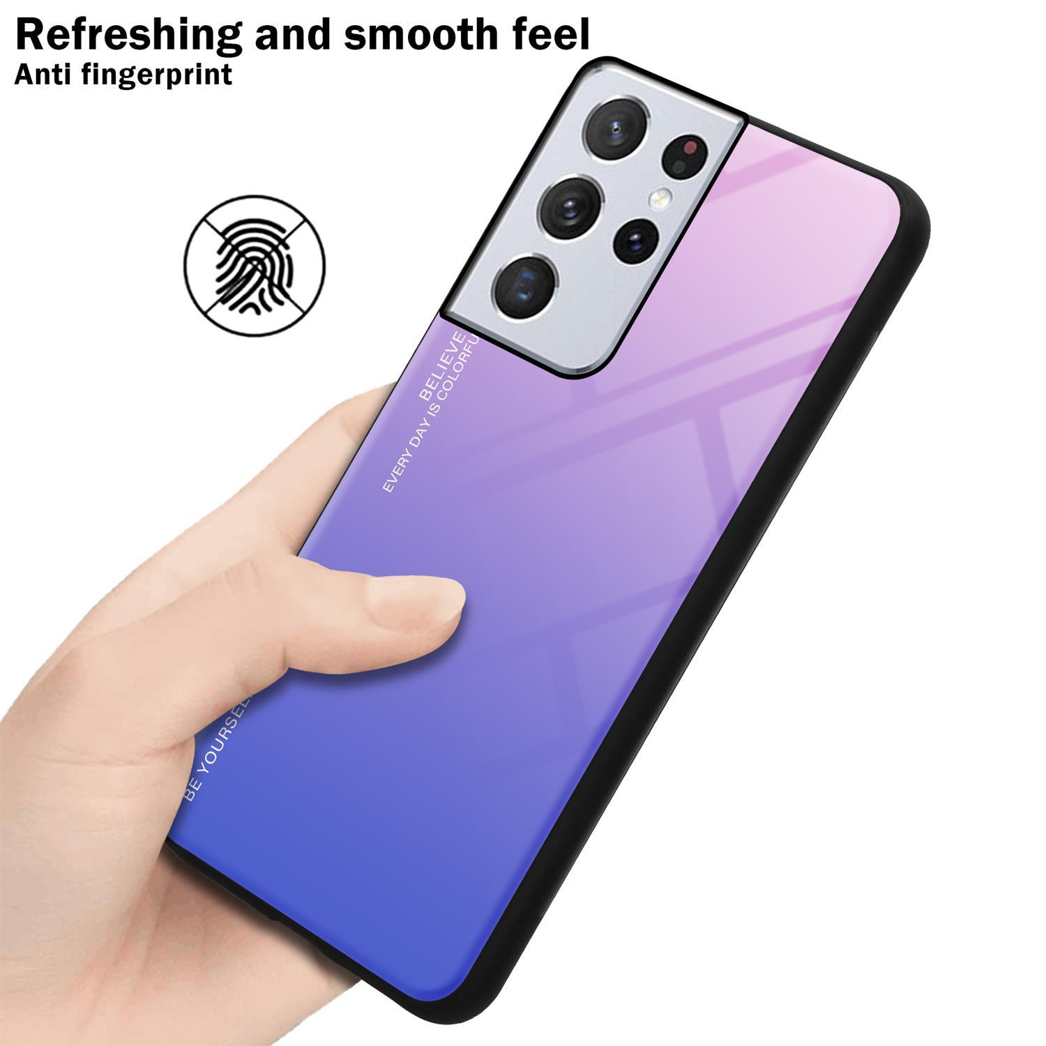 Una mano che tiene una custodia per telefono con una sfumatura dal viola al blu. Il testo sopra dice anti-impronte.