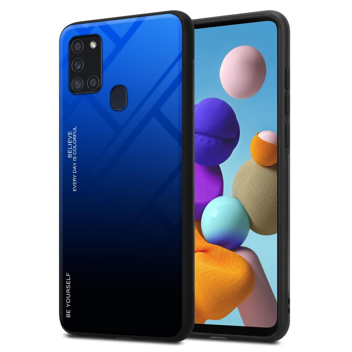 Blau-schwarze Handyhülle neben einem Telefon. Das Telefon hat einen bunten Hintergrund.