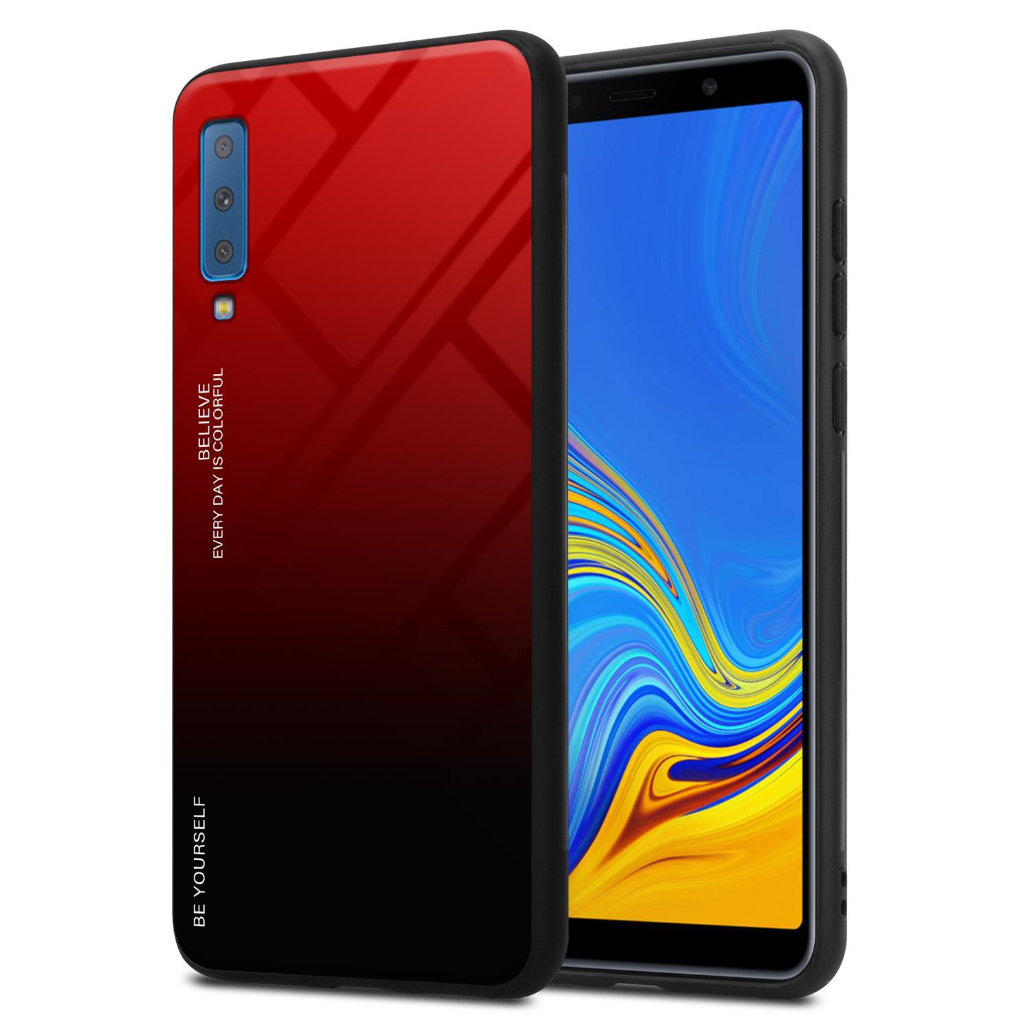 Una custodia per telefono con una sfumatura da rosso a nero. Il telefono è a destra e ha uno schermo blu.