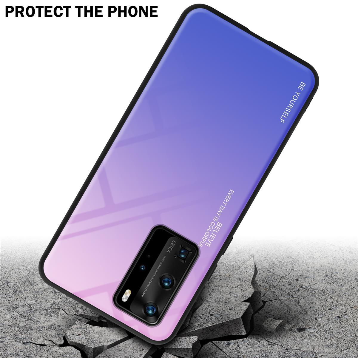 Ein Telefon mit einer blau-verlaufenden Hülle. Es lehnt an einer zerbrochenen Oberfläche.