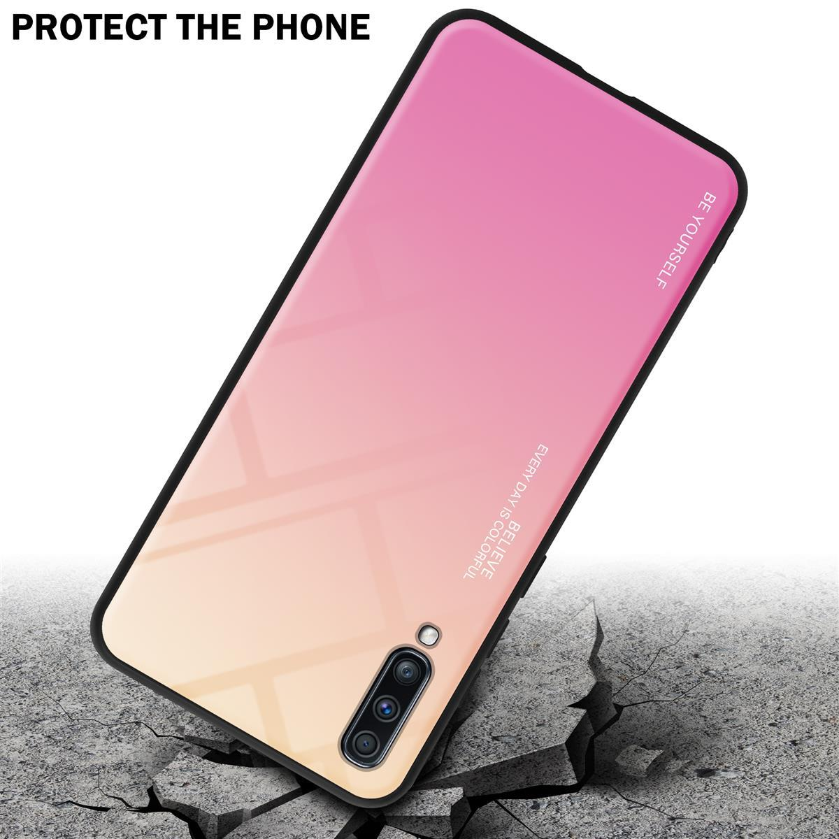 Custodia per telefono con design sfumato rosa-arancione, su cemento crepato.
