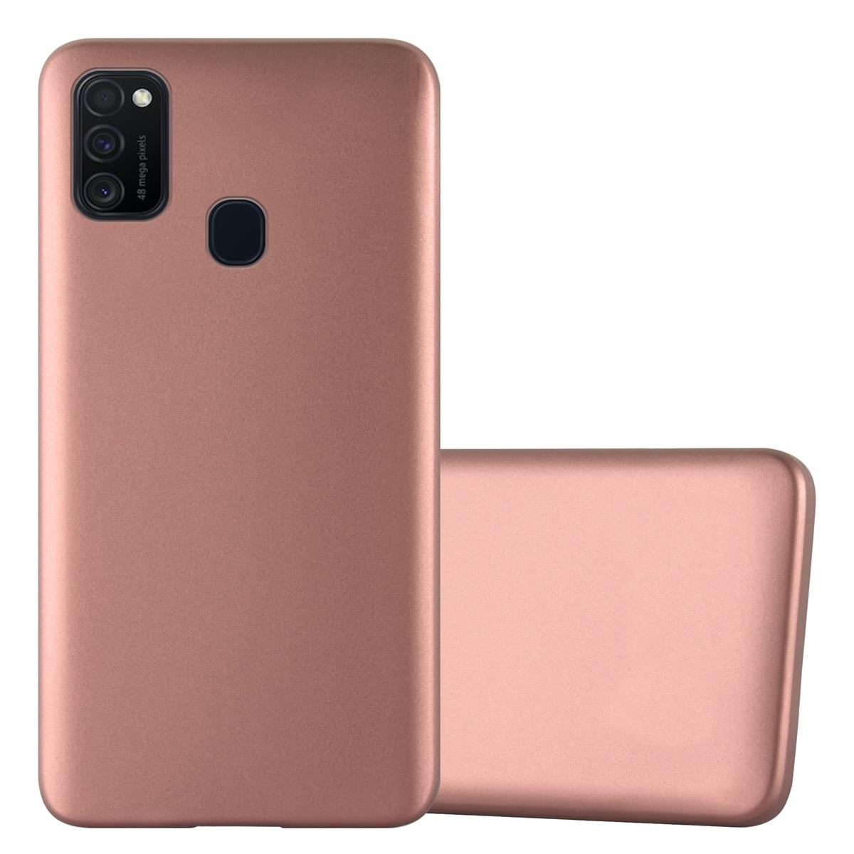 Funda y teléfono color oro rosa. La funda es lisa con recorte para la cámara.