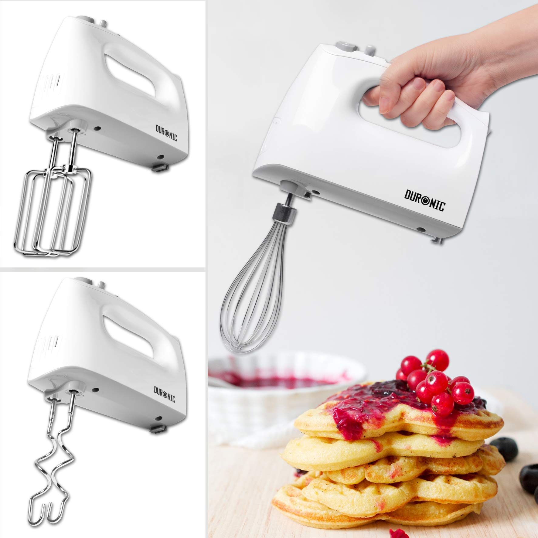 Weißer Handmixer mit Aufsätzen. Waffeln mit Beeren auf der Seite.