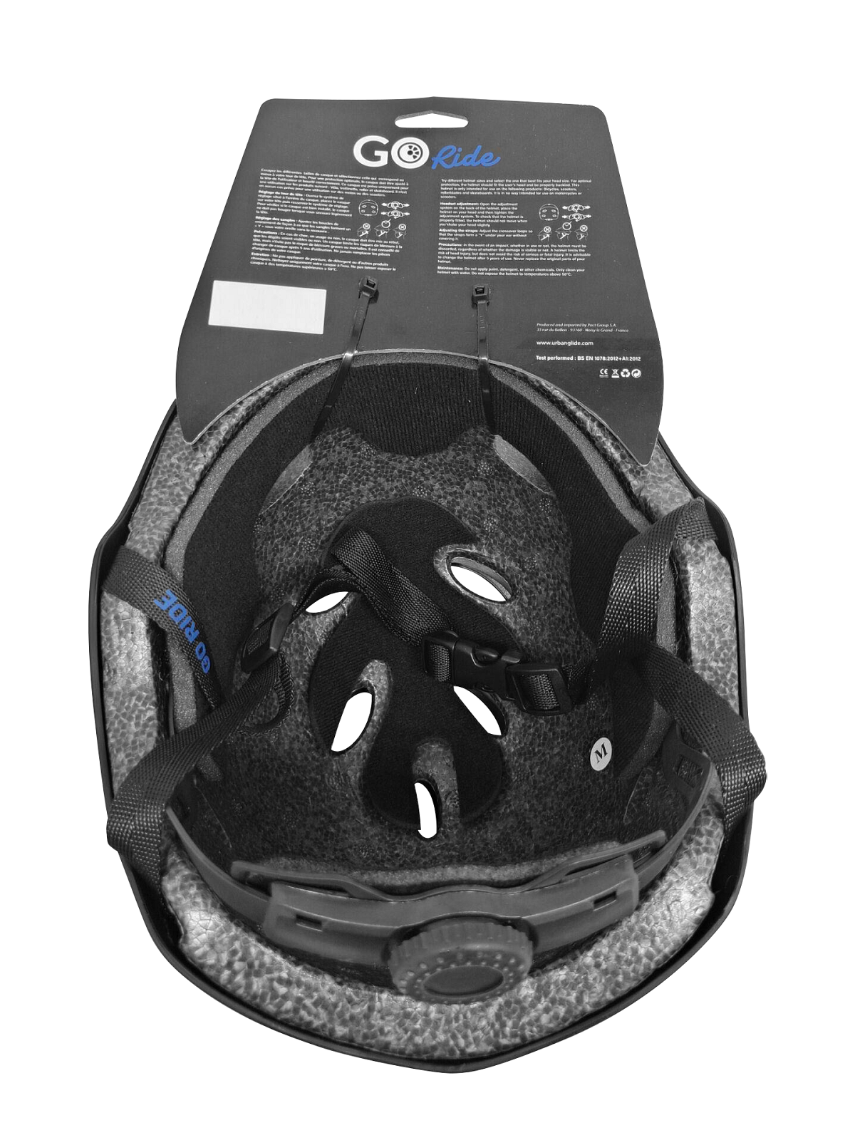 Casco de bicicleta negro y gris. Vista superior. Correas y perilla de ajuste visibles.