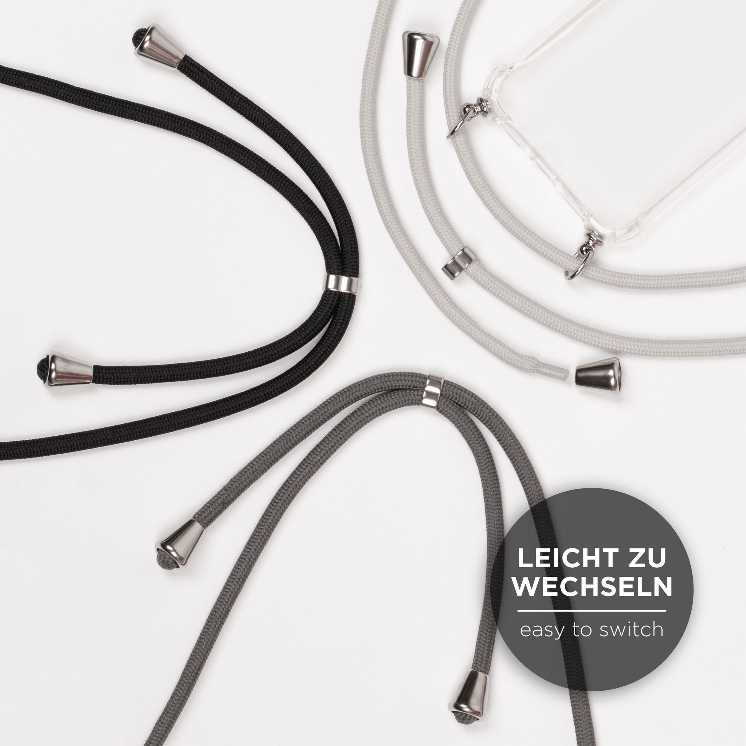 Nahaufnahme von Telefonkabeln in Schwarz, Grau und Klar. Der Text lautet 'easy to switch'.