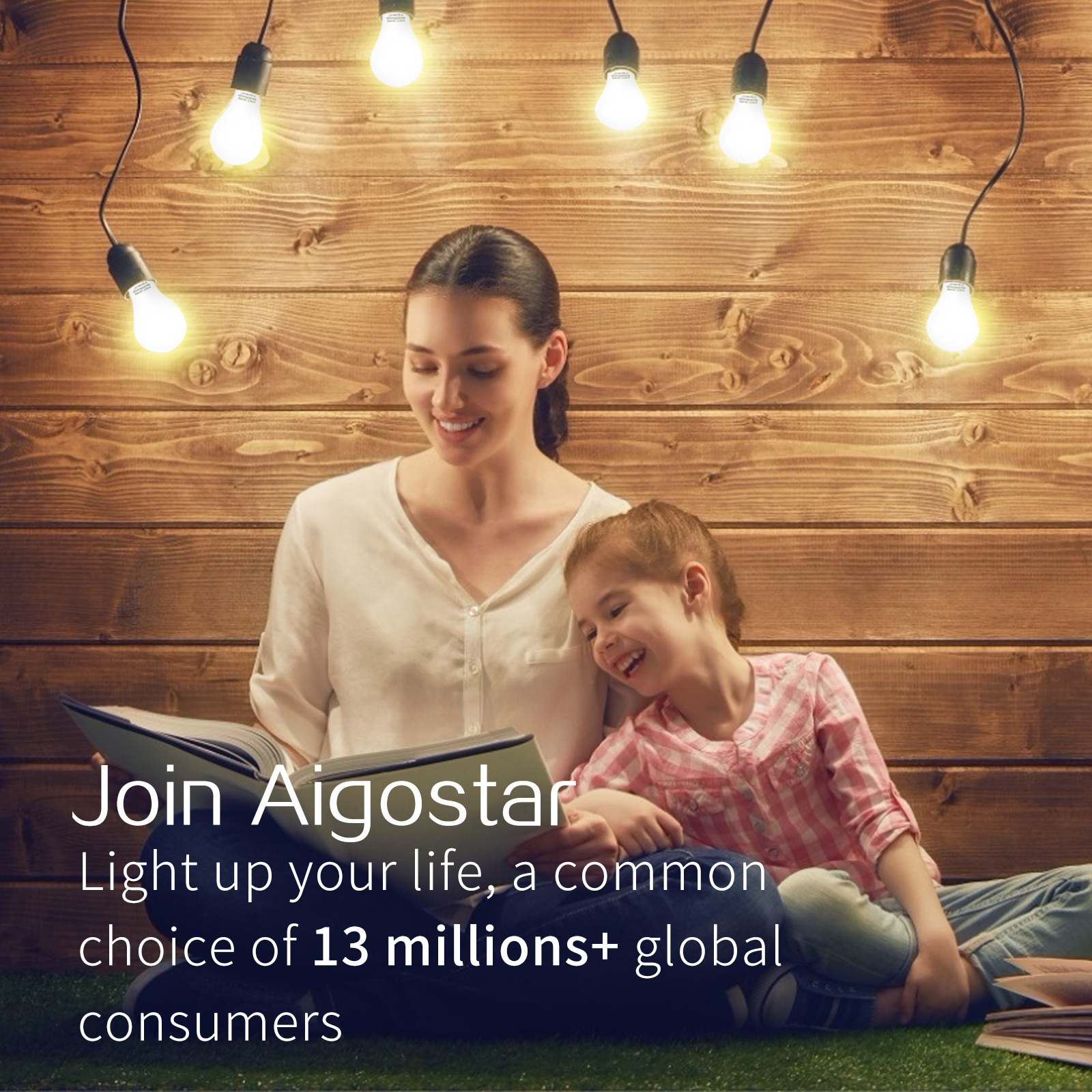Madre e hija leyendo un libro bajo luces colgantes, con texto: Join Aigostar. Ilumina tu vida.