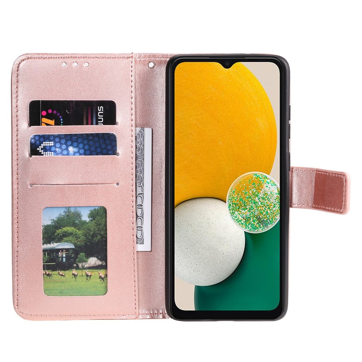 Eine pinkfarbene Handyhülle im Brieftaschenstil, geöffnet, mit Telefon, Karten und Bild.