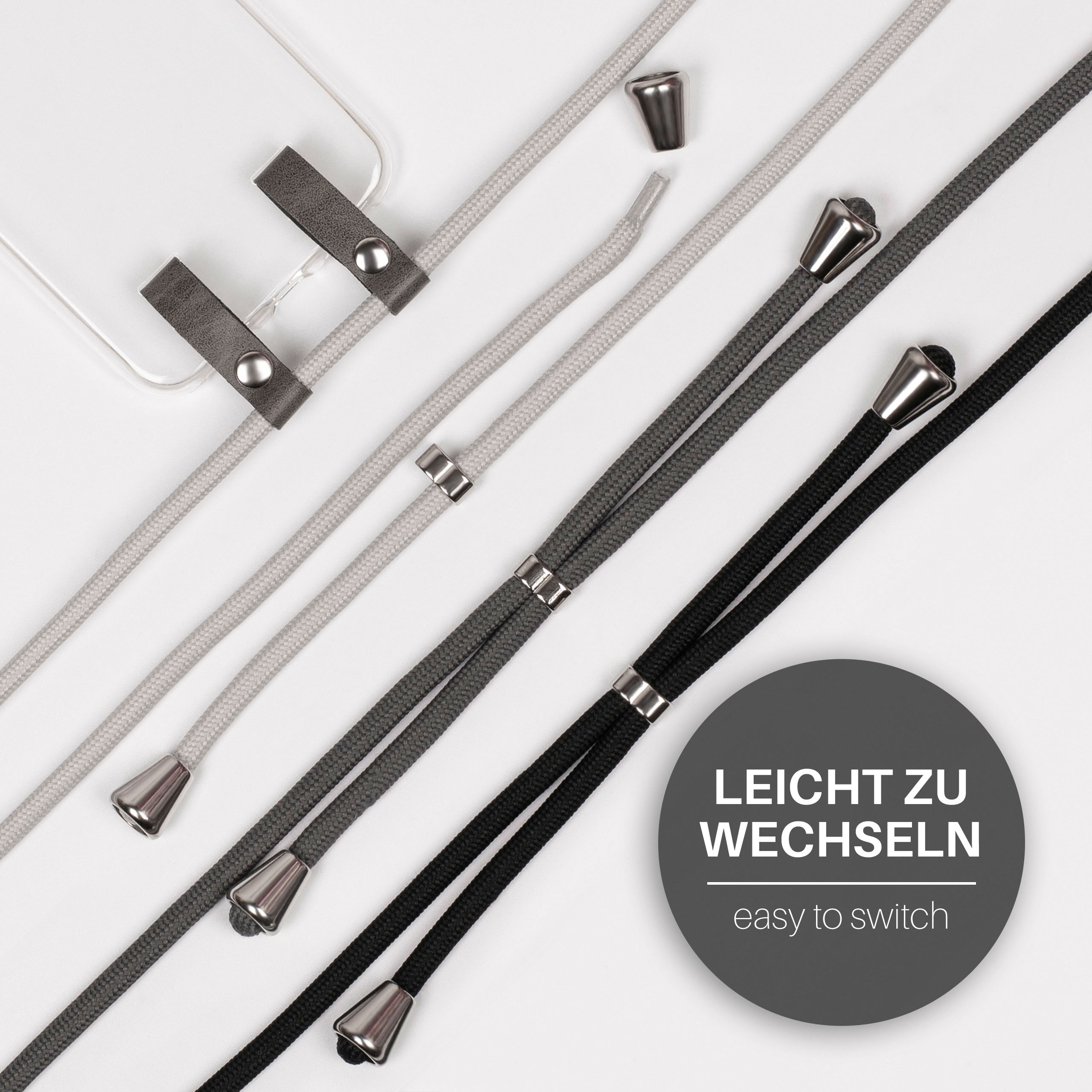 Handyhüllen-Kordeln in Grau, Hellgrau und Schwarz. Der Text 'leicht zu wechseln' steht rechts.