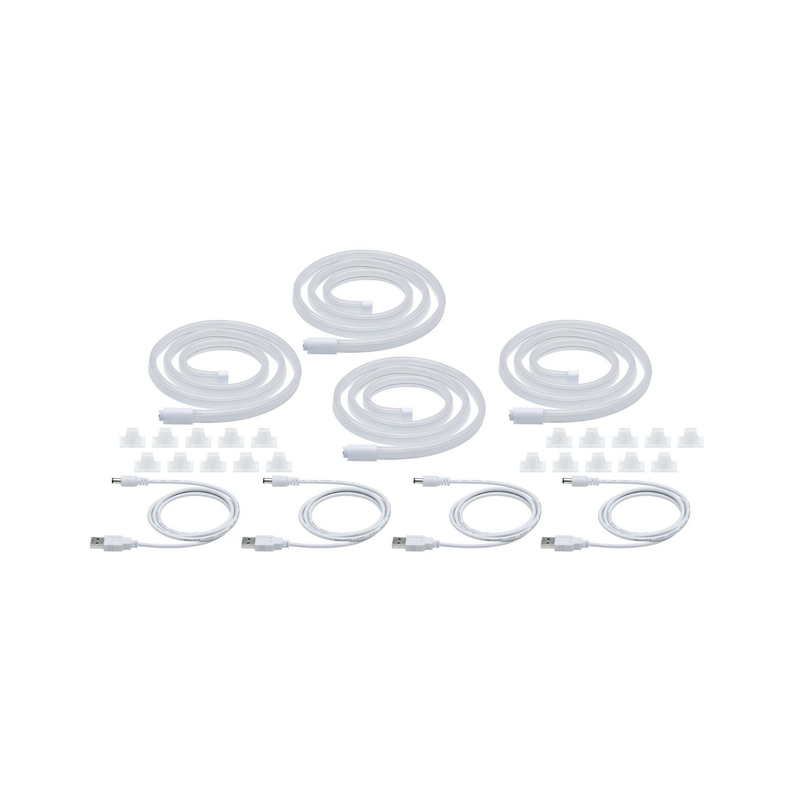 Kilka białych pasków LED i złączy. Części leżą na białej powierzchni.