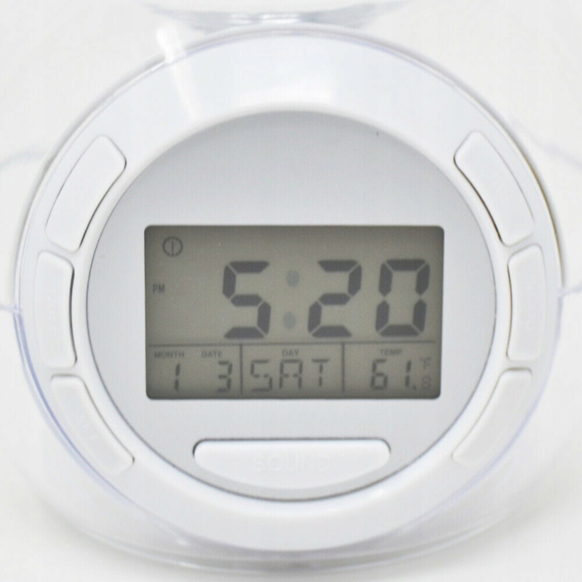 Reloj digital blanco mostrando 5:20, con fecha y temperatura.