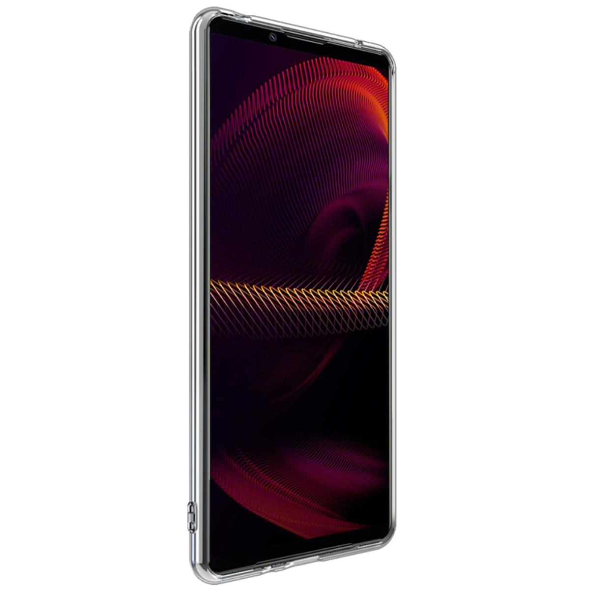 Ein Telefon mit klarer Hülle, das ein rot-goldenes Design auf dem Display zeigt. Das Telefon ist vertikal.