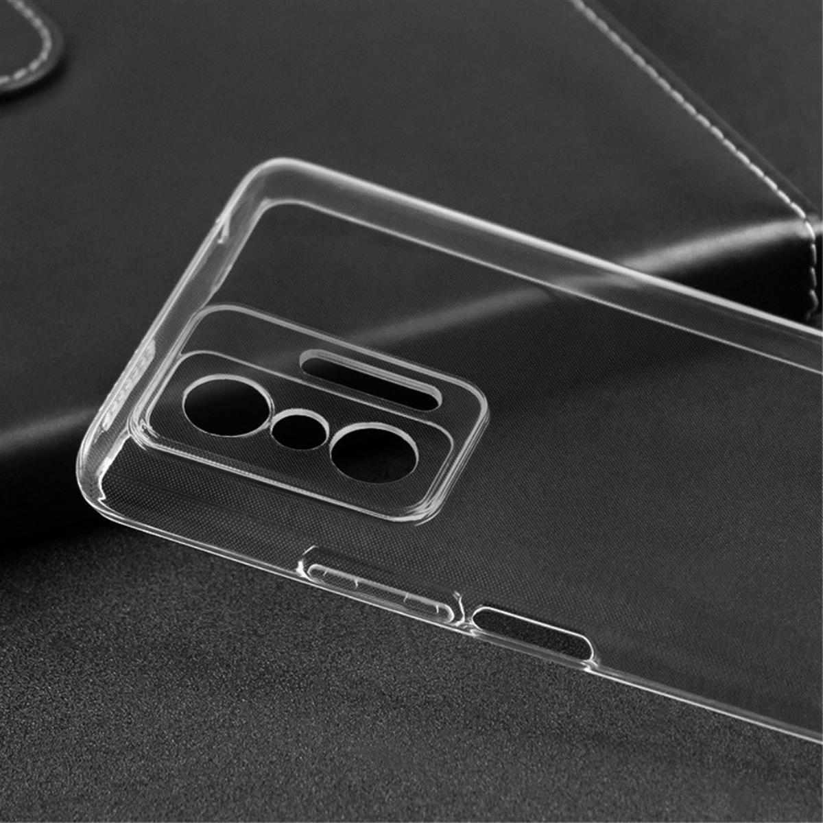 Eine transparente Handyhülle. Sie hat eine Kameraöffnung und liegt auf einer schwarzen lederartigen Oberfläche.