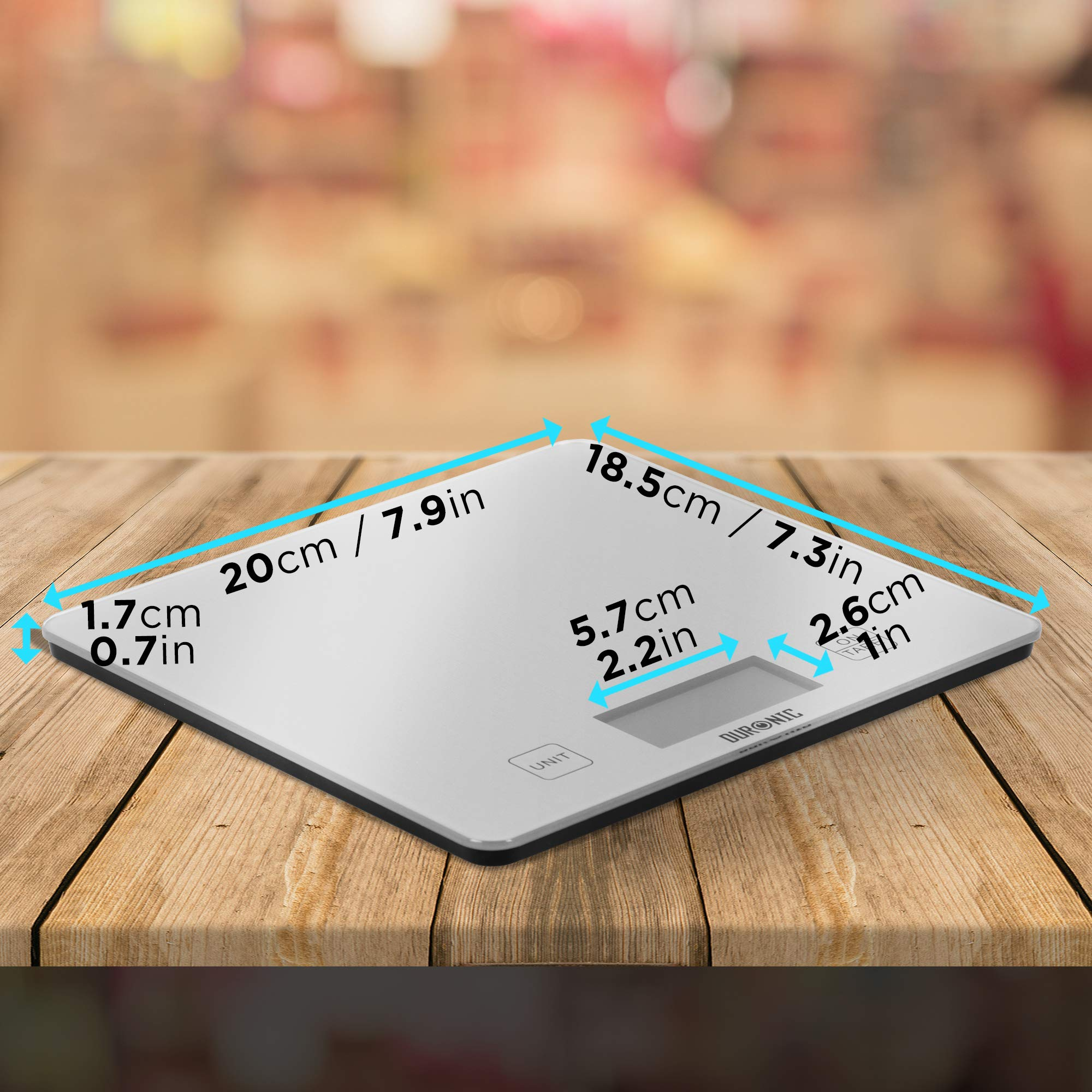 Báscula de cocina digital. Las dimensiones se muestran con flechas y texto en la superficie.