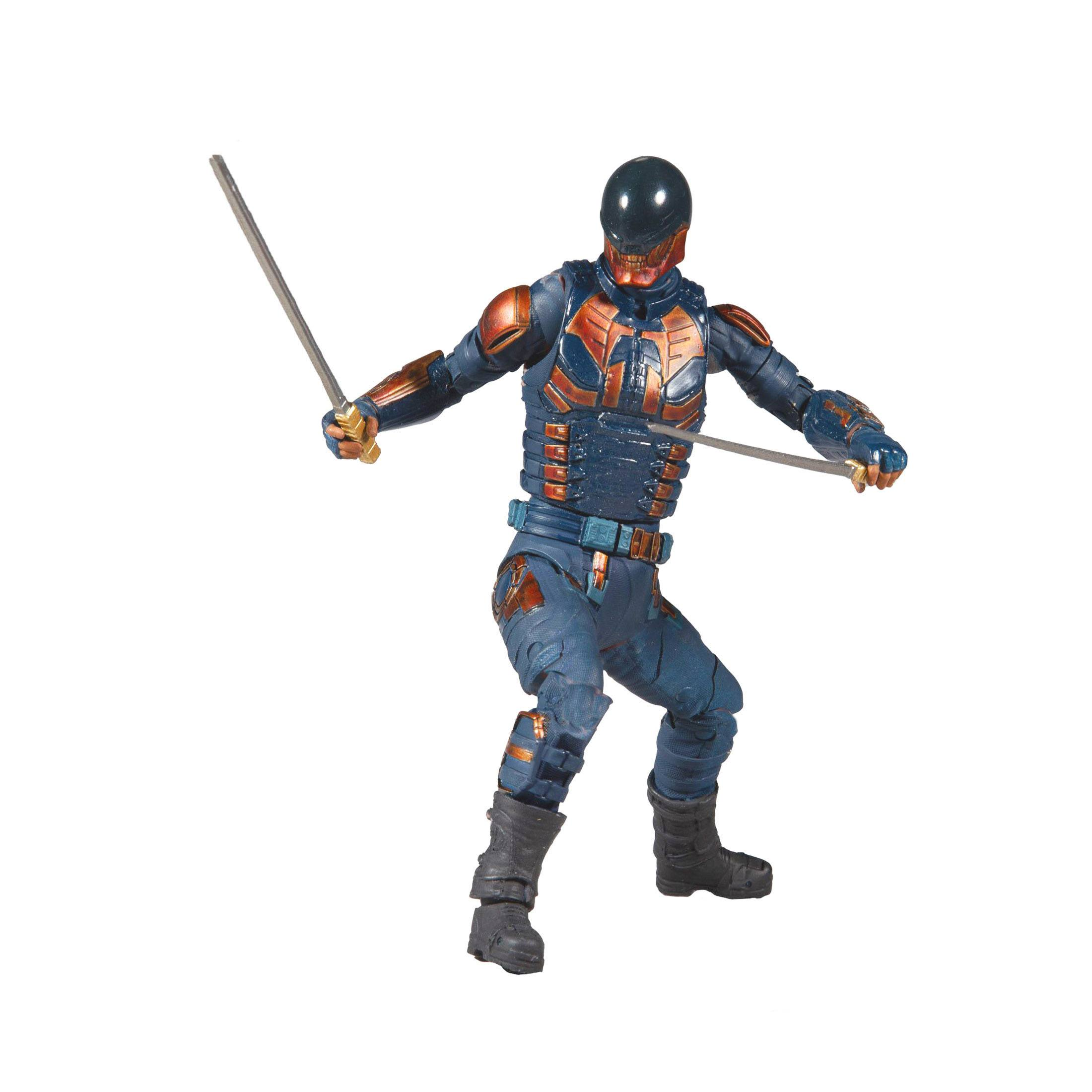 Actionfigur eines Charakters in blauer und orangefarbener Rüstung mit zwei Schwertern. Weißer Hintergrund. Es ist eine Kampfpose.