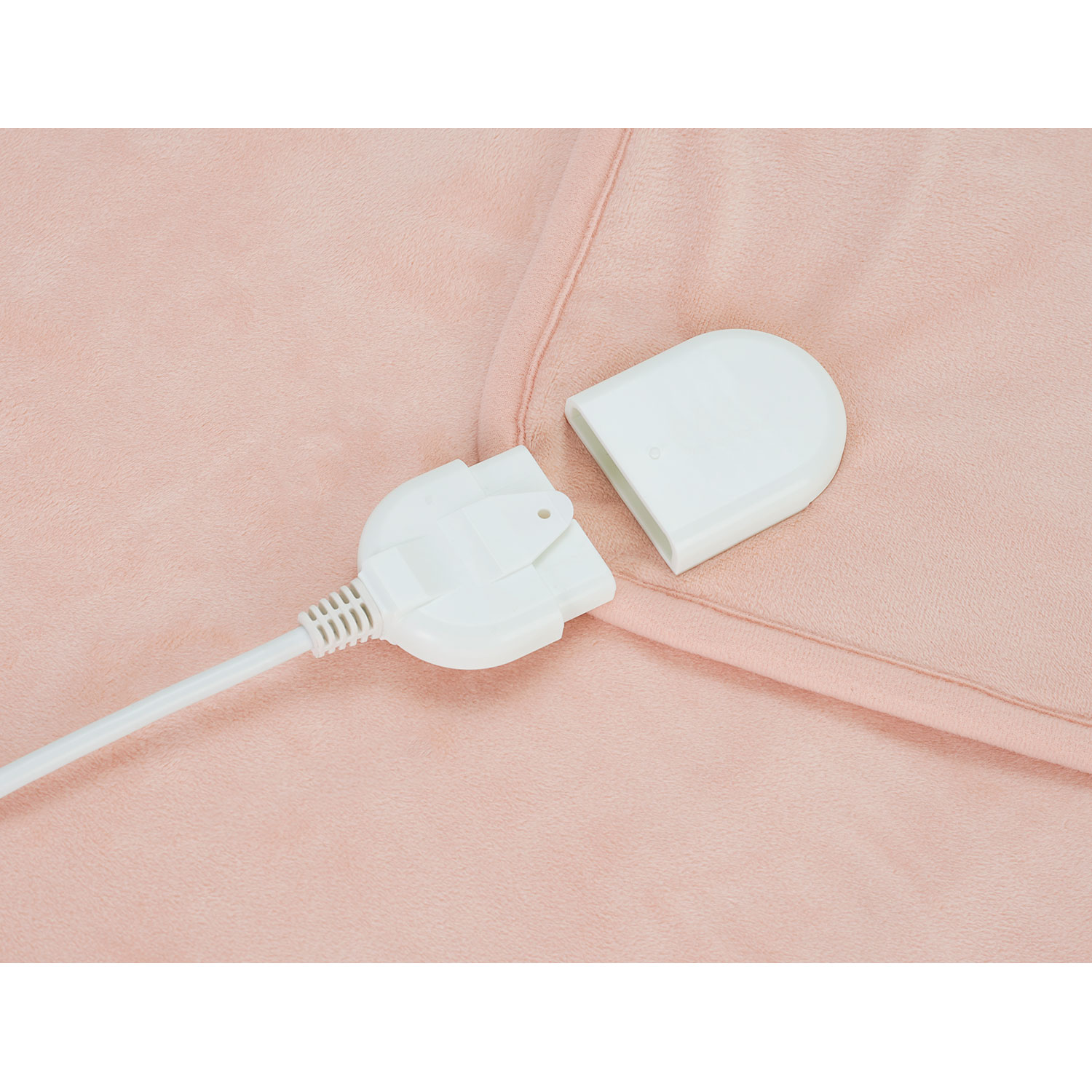 Coperta termica rosa con spina bianca e coperchio.