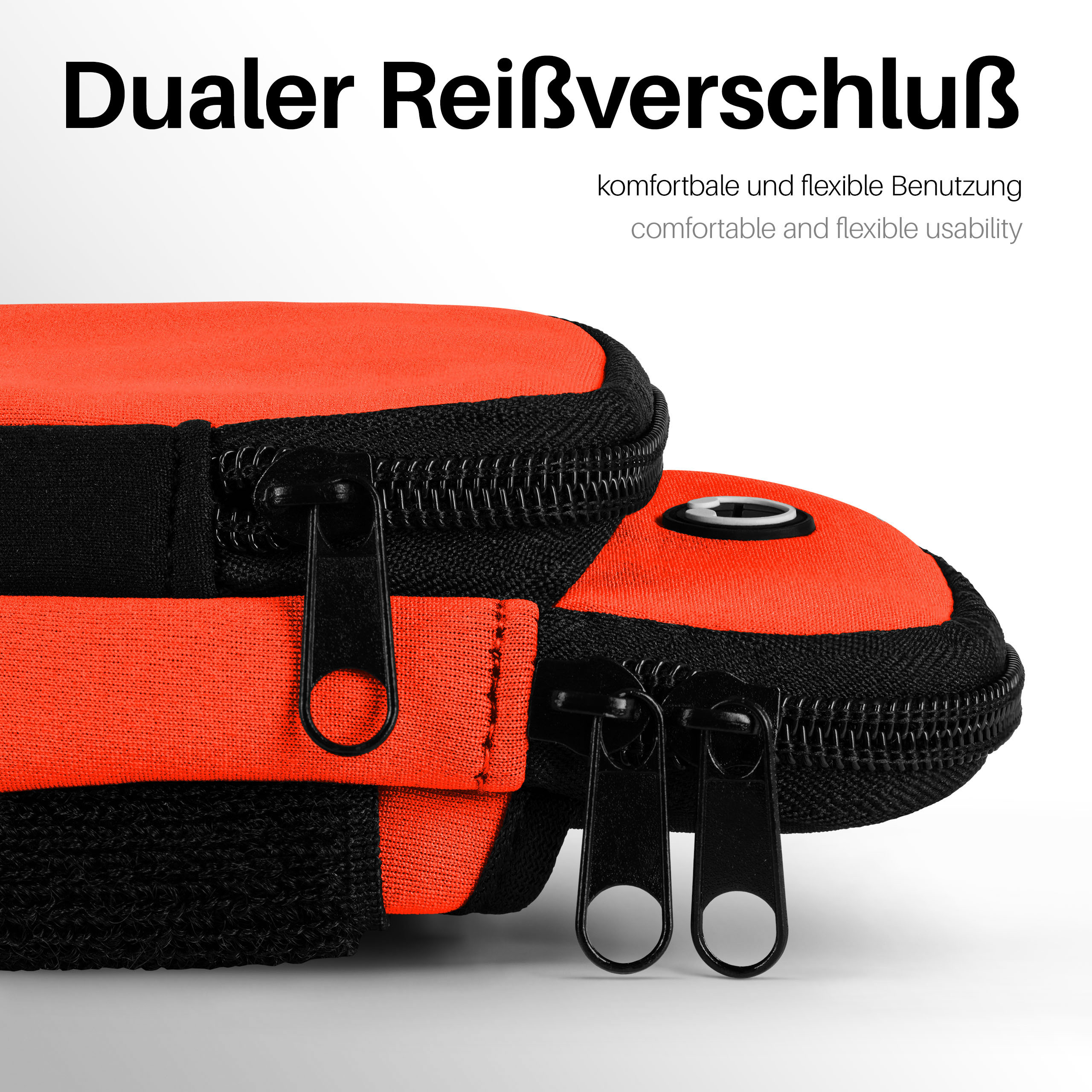 Nahaufnahme eines orange-schwarzen Armbands mit zwei Fächern und zwei schwarzen Reißverschlüssen. Text: 'Dualer Reißverschluss'.