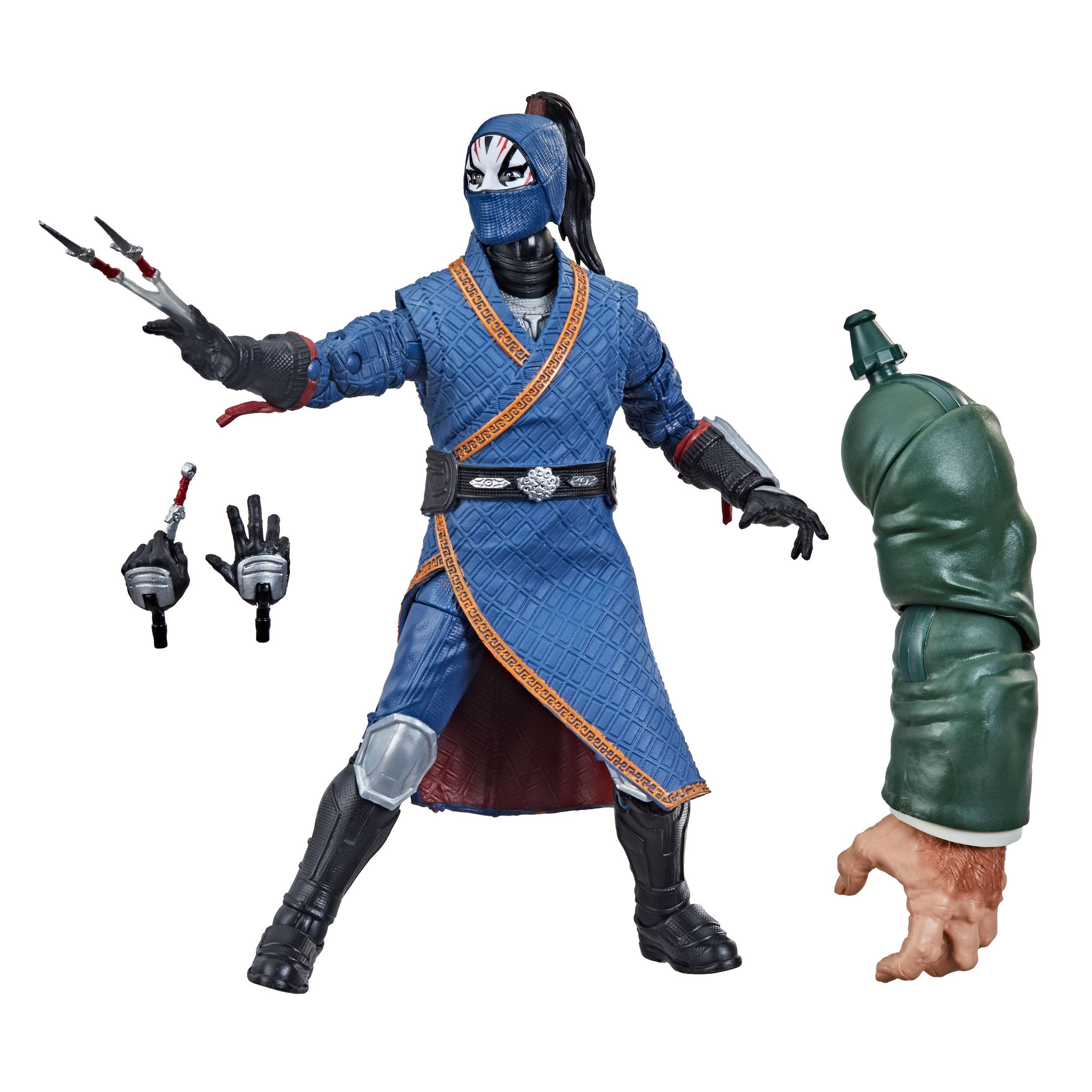 Eine Ninja-Actionfigur mit mehreren Zubehörteilen, darunter Waffen und zusätzliche Hände, in einer dynamischen Pose.