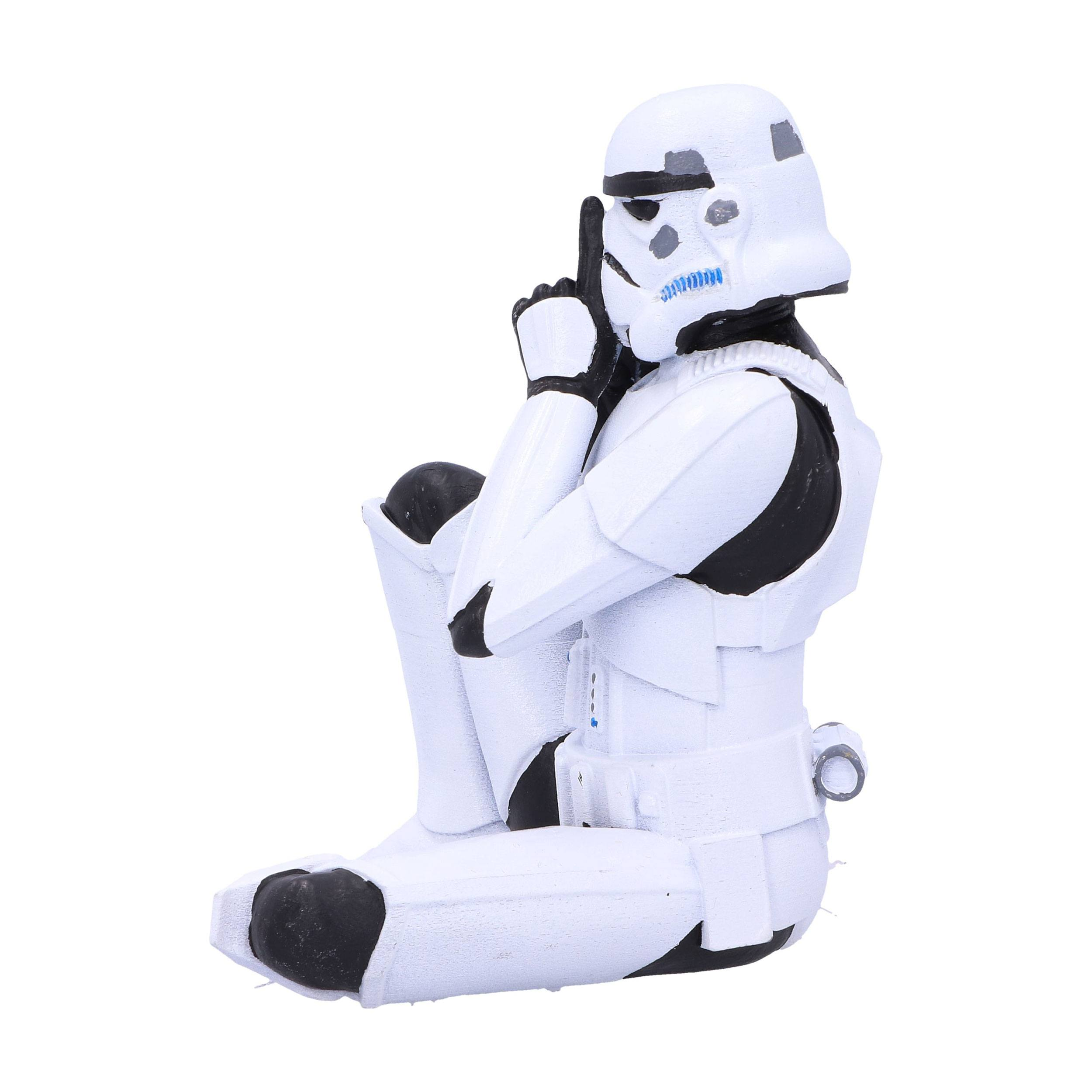 Eine Stormtrooper-Figur in sitzender, meditierender Pose, mit weißem Hintergrund.