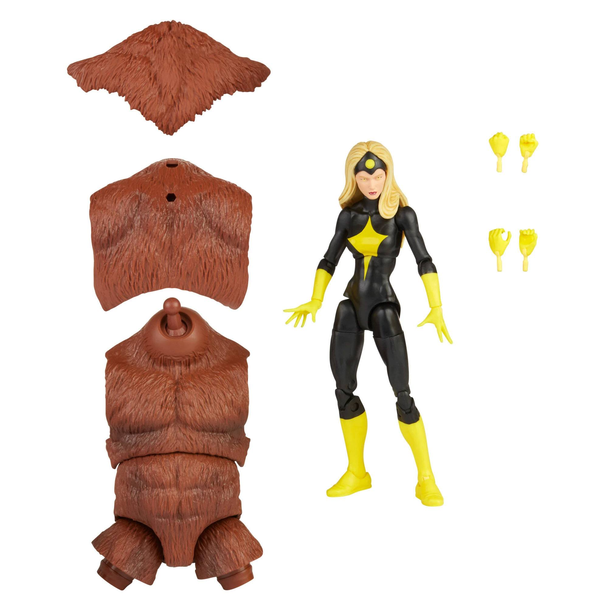 Eine weibliche Actionfigur mit braunen Teilen. Sie trägt schwarze und gelbe Kleidung. Gelbe Fäuste.
