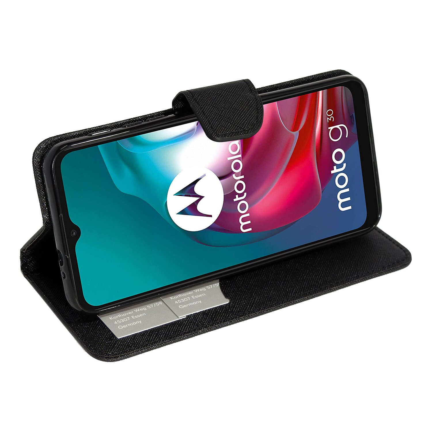 Ein schwarzes Motorola Moto G30-Telefon in einem geschlossenen Gehäuse, das Bildschirm- und Coverdetails zeigt.