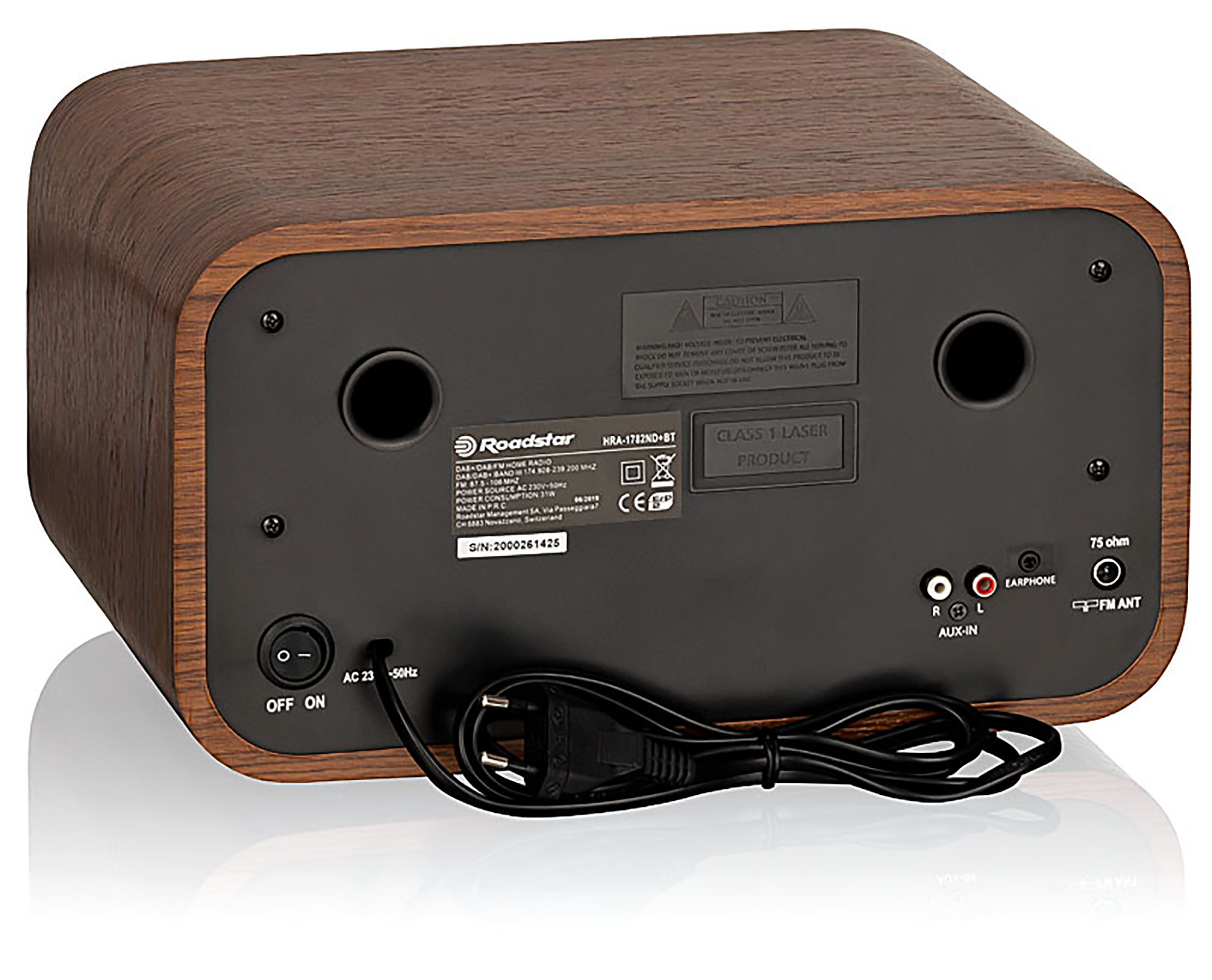 Drewniane radio. Tył ma kilka portów, przełącznik i kabel.