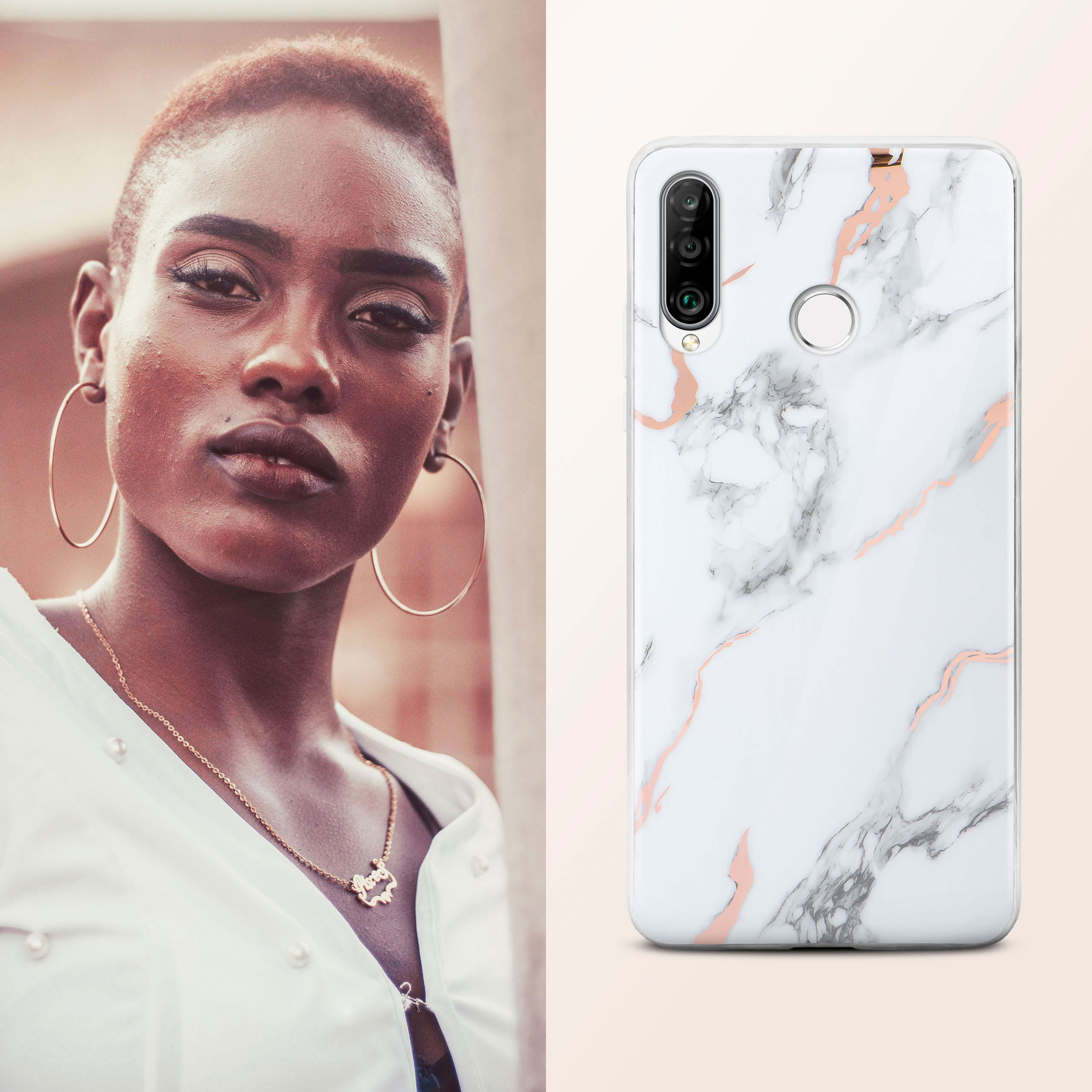 Eine Frau mit Creolen und eine Handyhülle mit Marmordesign, neben einem Telefon.