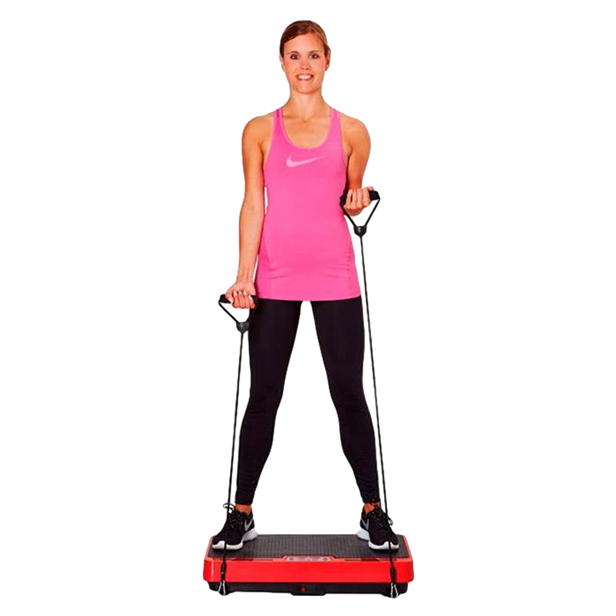 Une femme en débardeur rose et legging noir est debout sur une plateforme vibrante rouge.
