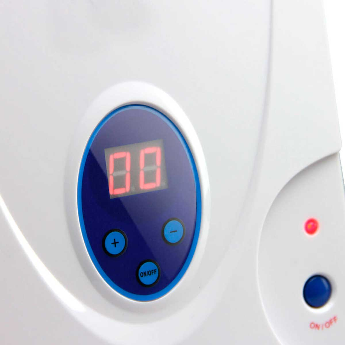Un dispositivo blanco con una pantalla ovalada azul que muestra 0.0, con botones más y menos y un botón de encendido/apagado.