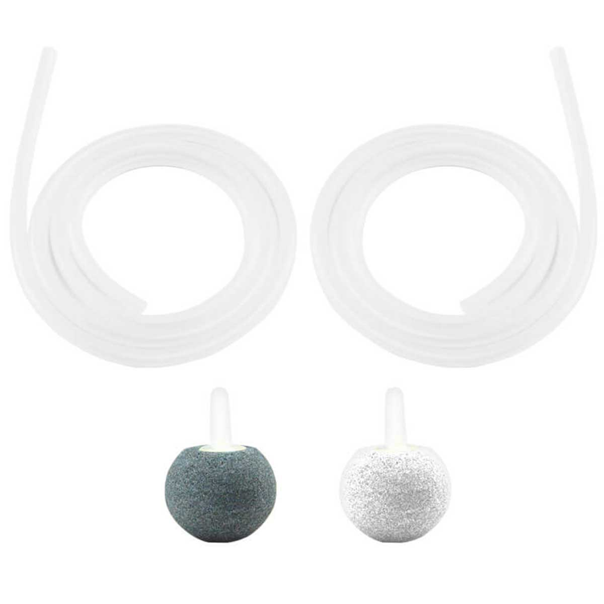 Dos piedras de aire y dos líneas de aire para un acuario. Tubos blancos y piedras grises y blancas.