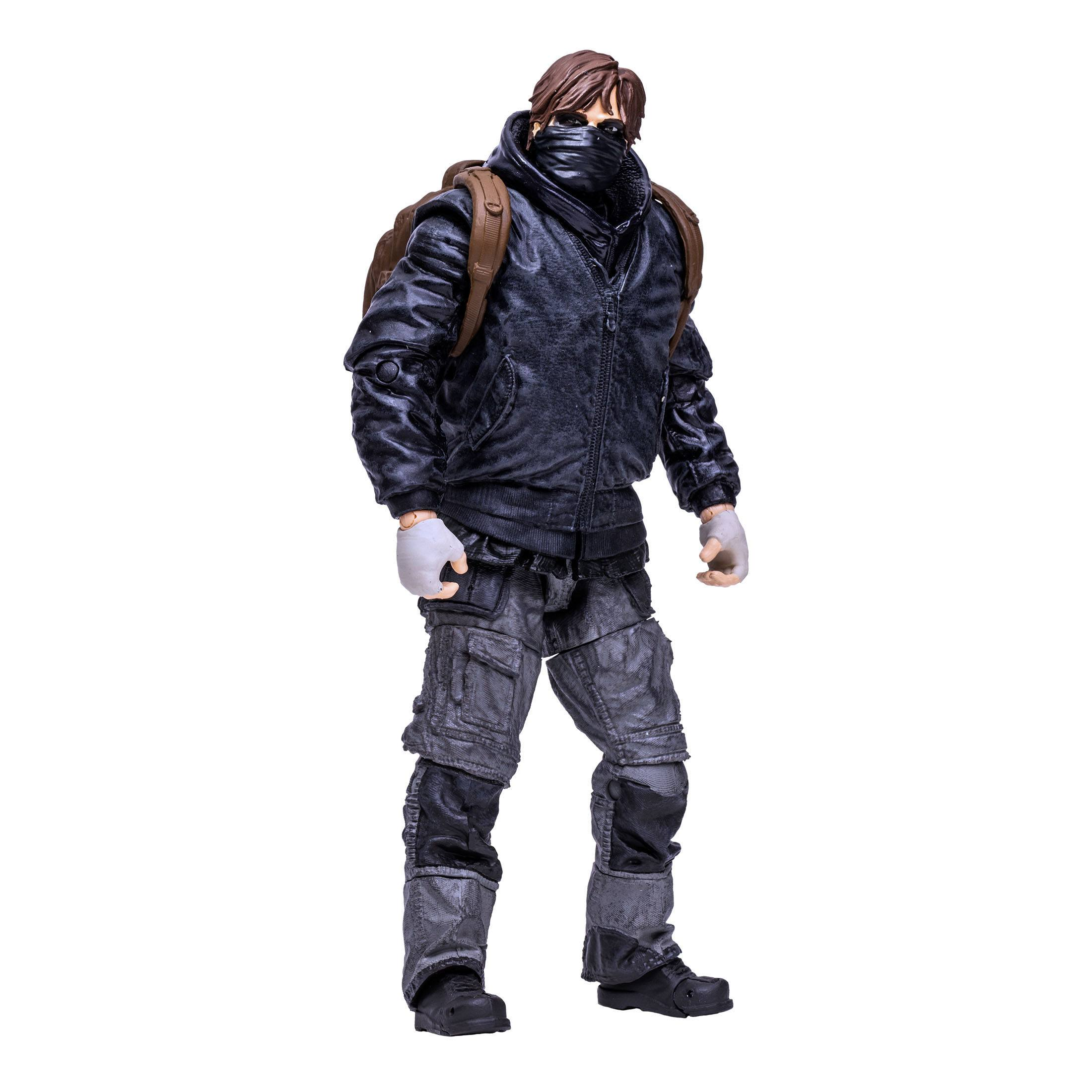 Actionfigur eines maskierten Mannes in Jacke, Cargohose und Rucksack.