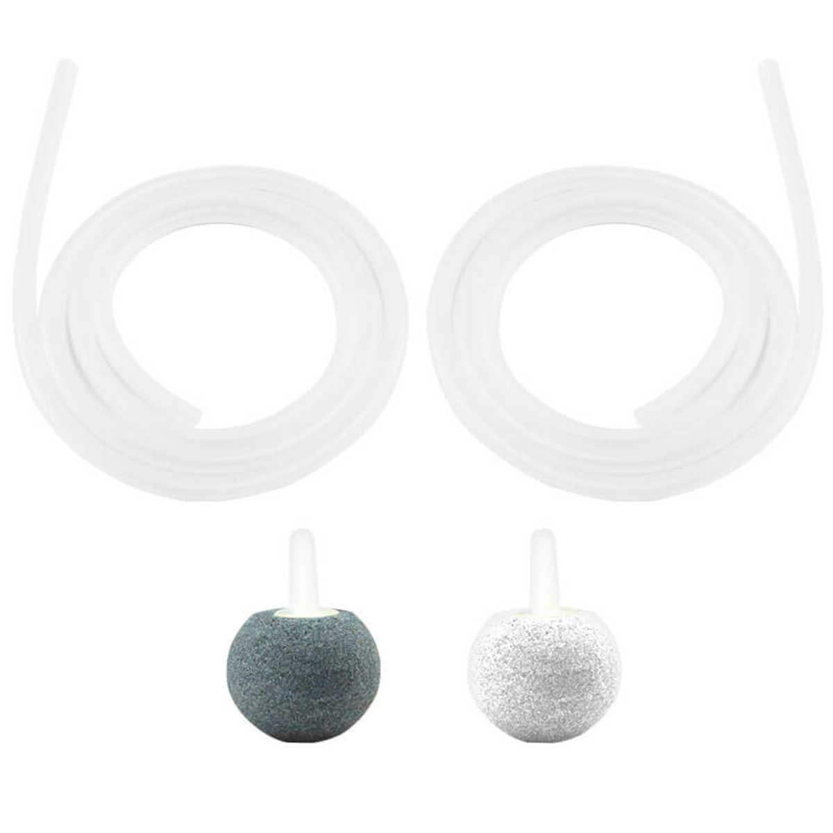 Dos piedras de aire blancas para un acuario. Dos tubos transparentes están conectados a las piedras.