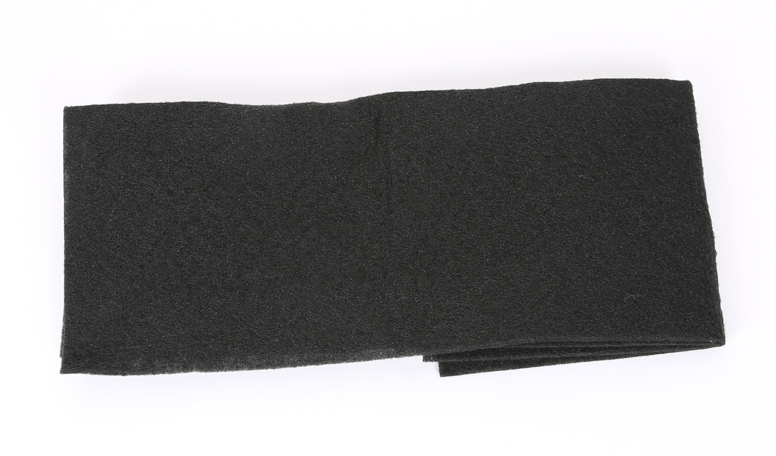 Black fabric roll on white background, top view, no people.