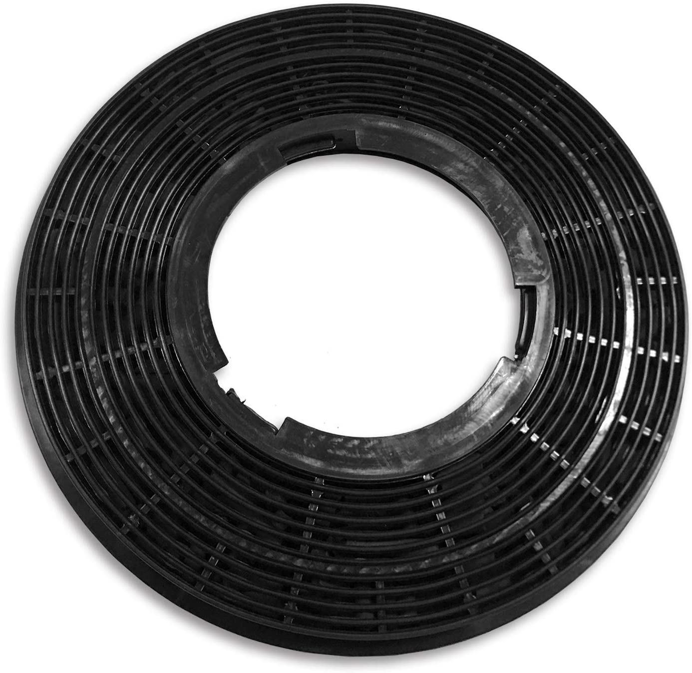 Black, circular, carbon filter with a central hole, white background.
