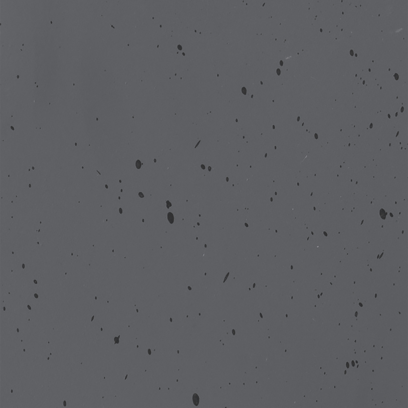 Grauer Hintergrund mit schwarzen Punkten.