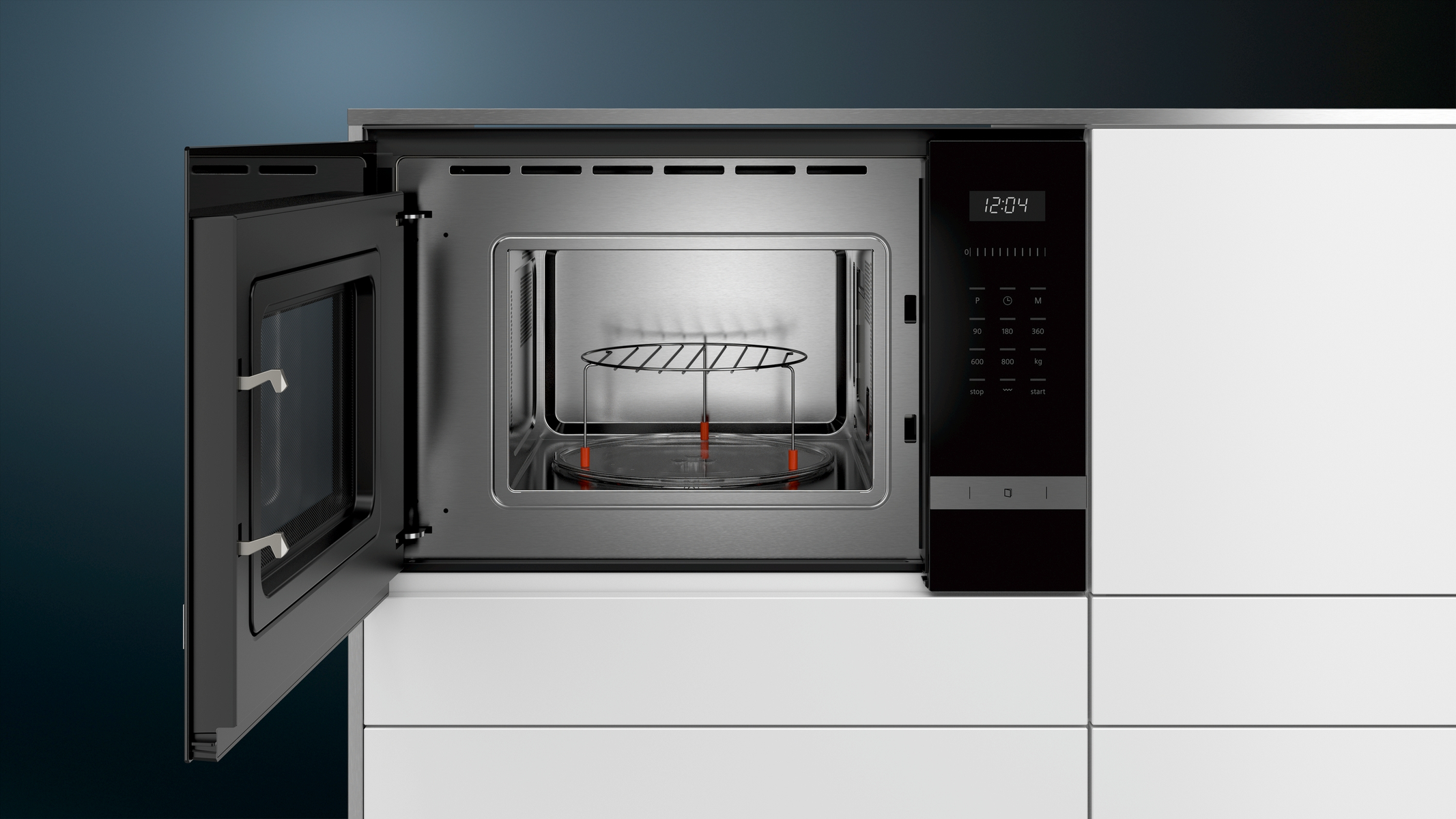 Microwave oven, door open. It has a stainless steel interior with a glass tray and control panel.