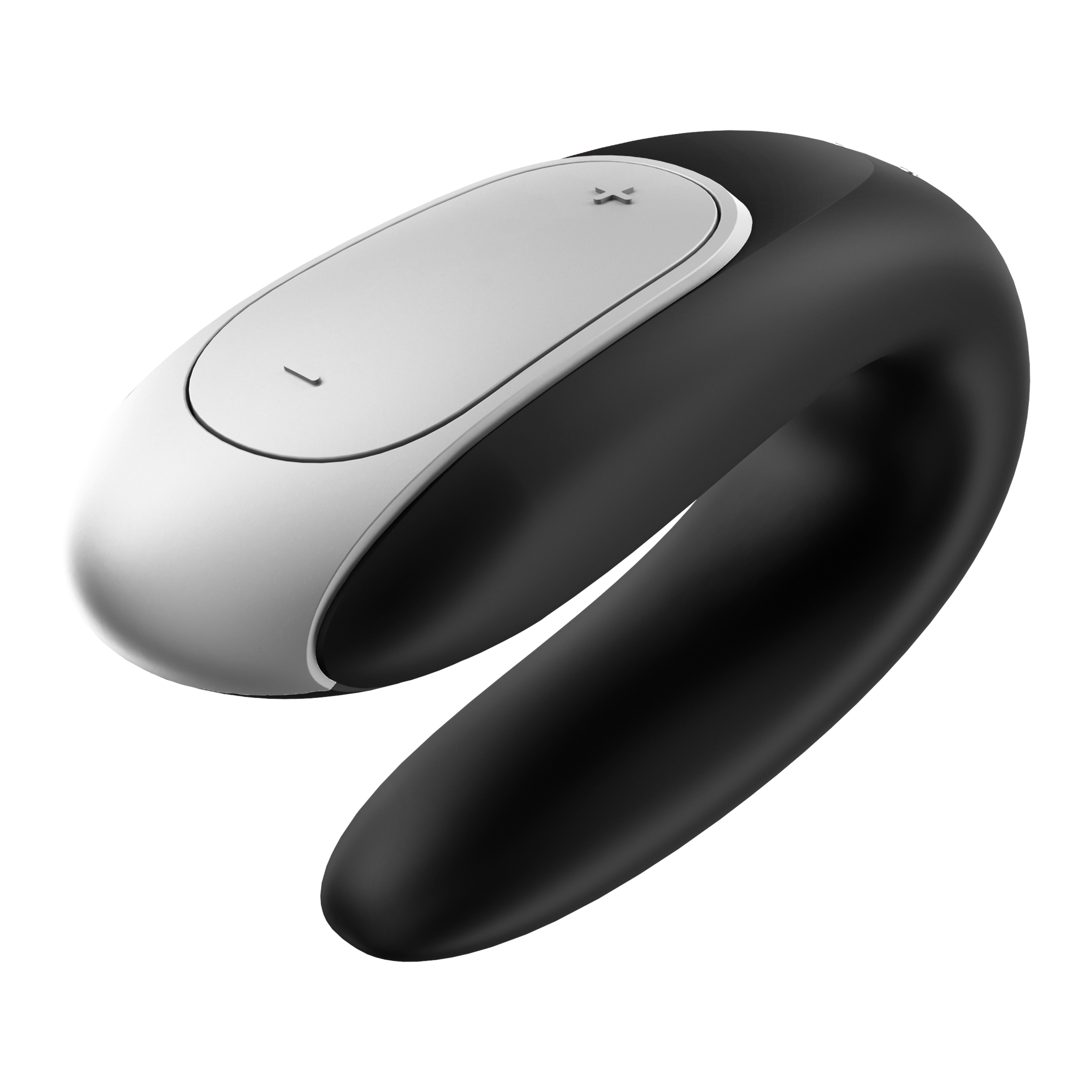 Czarno-biała zabawka erotyczna o zakrzywionym kształcie na czarnej powierzchni.