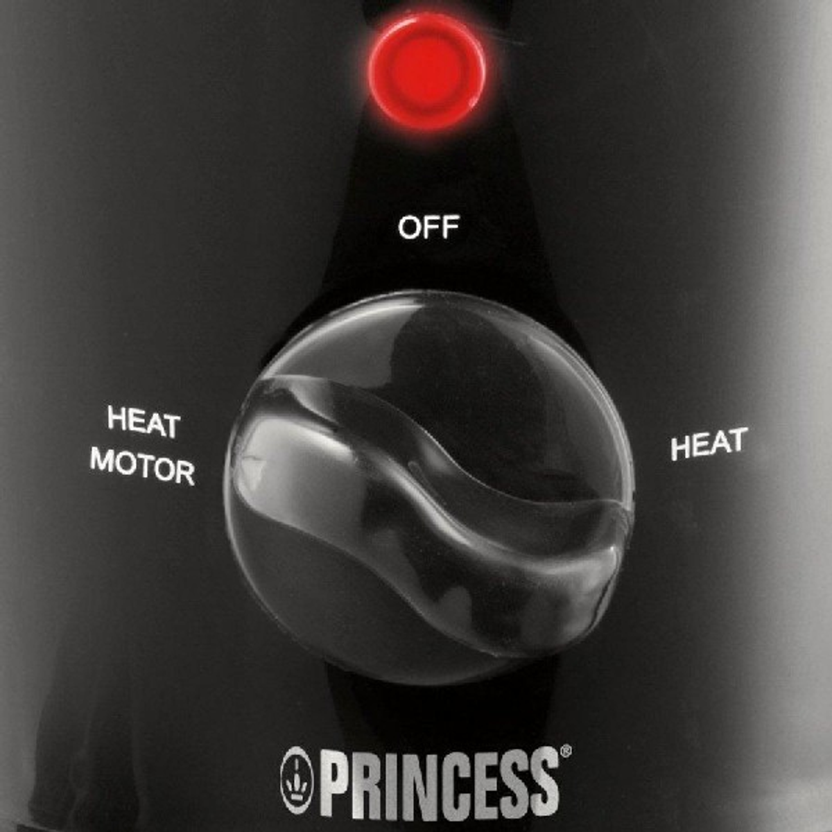 Ein schwarzes Bedienfeld mit Drehregler und den Beschriftungen 'OFF', 'HEAT MOTOR' und 'HEAT'.