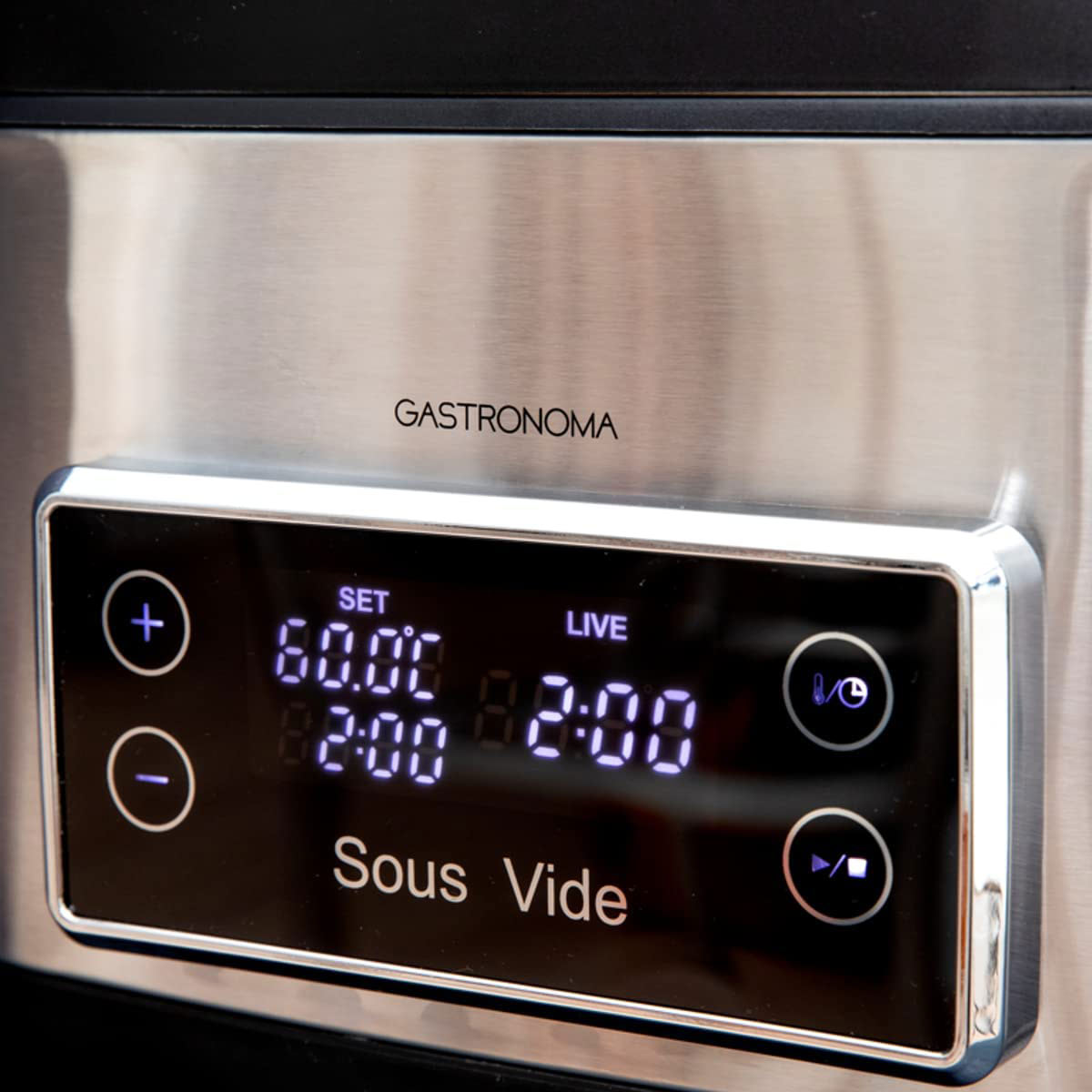 Sous Vide cooking device with display showing temperature and time. 