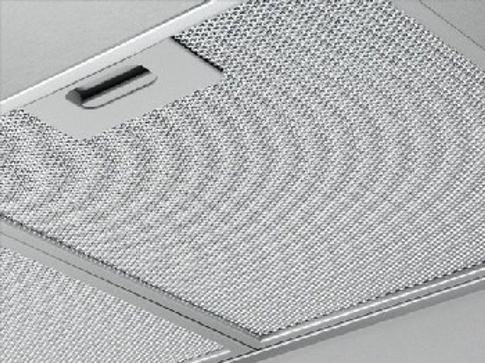 Close-up of a metal mesh filter, viewed from above.