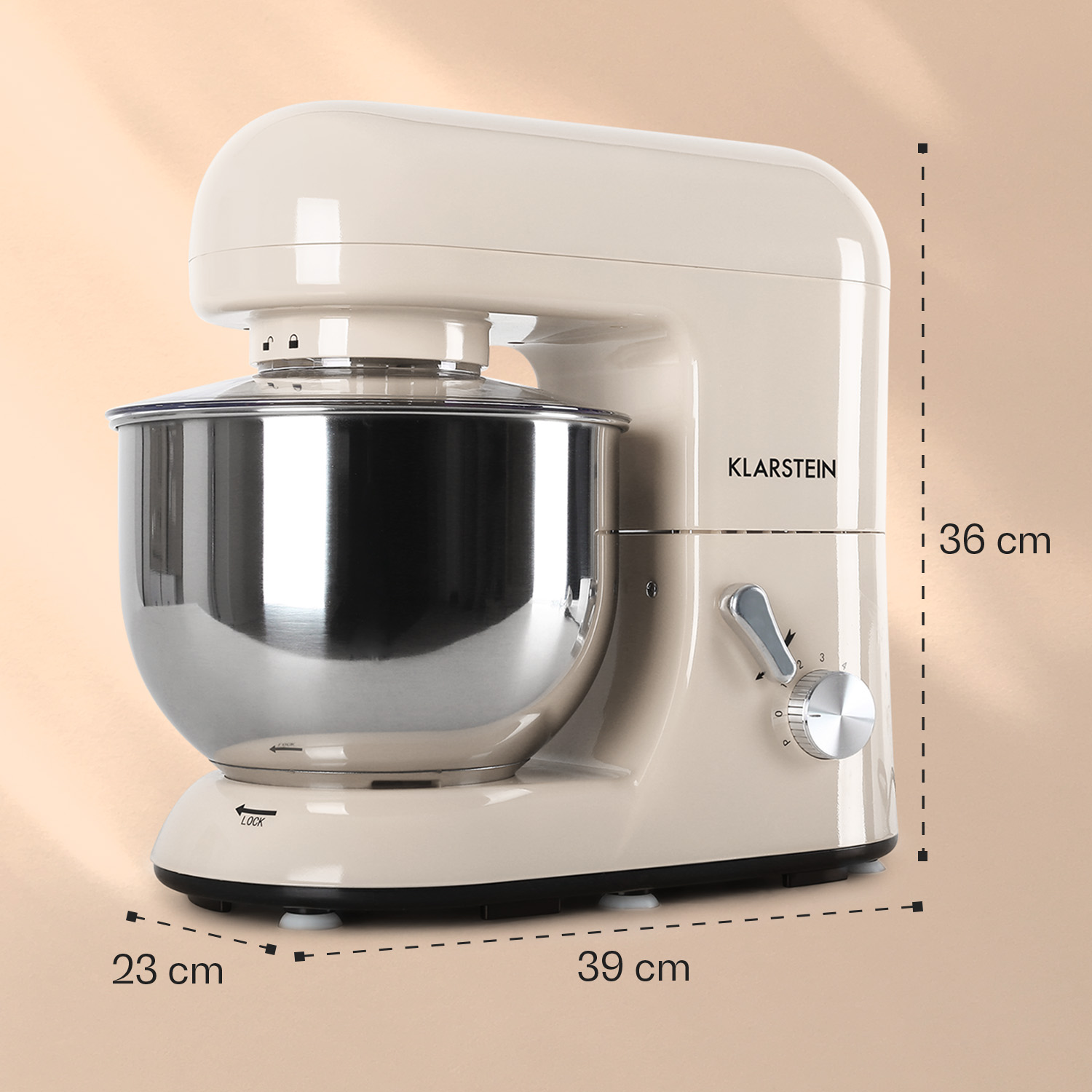 Impastatrice da cucina beige con etichette delle dimensioni. Mostra 23 cm di larghezza, 39 cm di lunghezza e 36 cm di altezza.