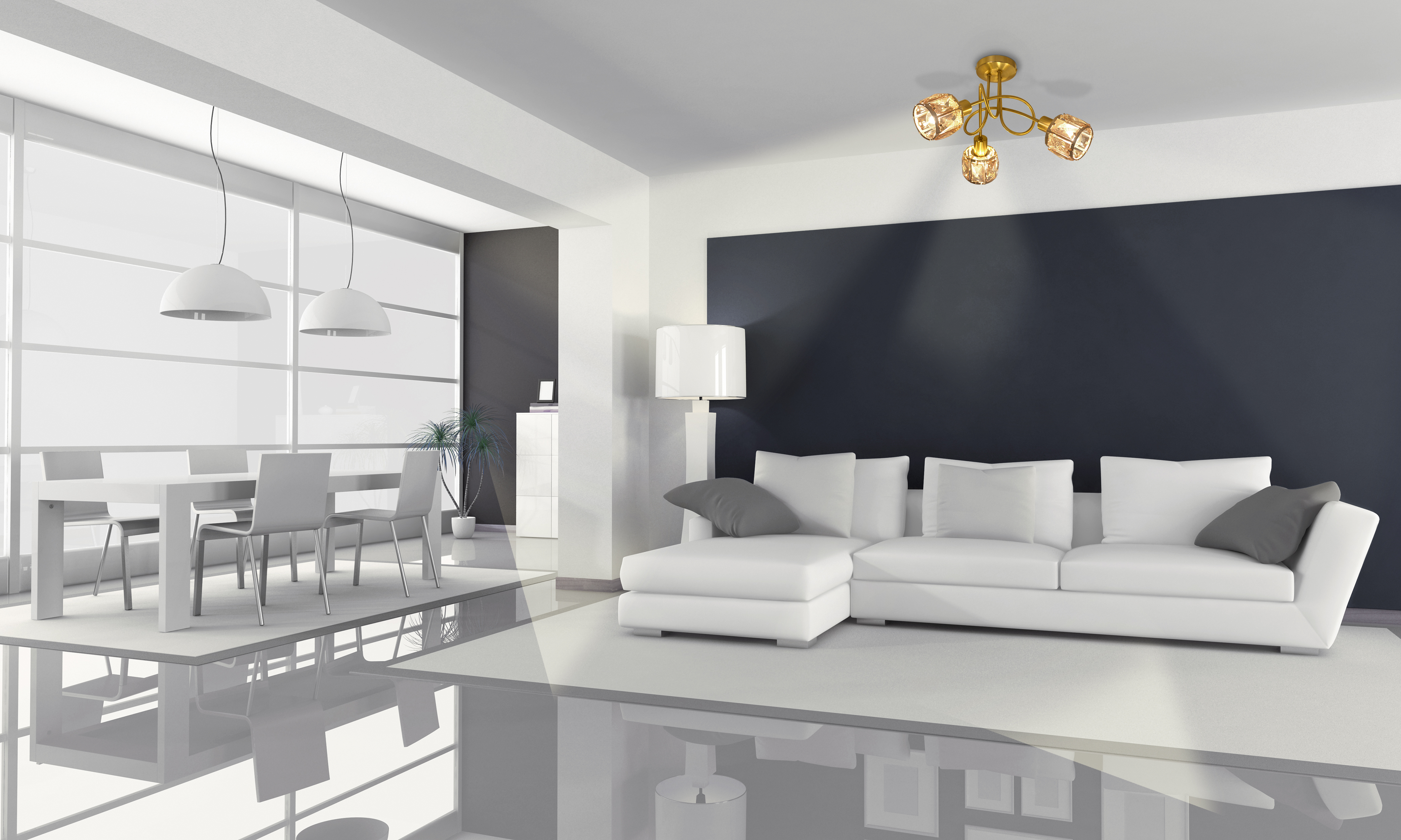 Ein modernes Wohnzimmer mit weißen Möbeln, einer dunkelblauen Wand und einem Kronleuchter.