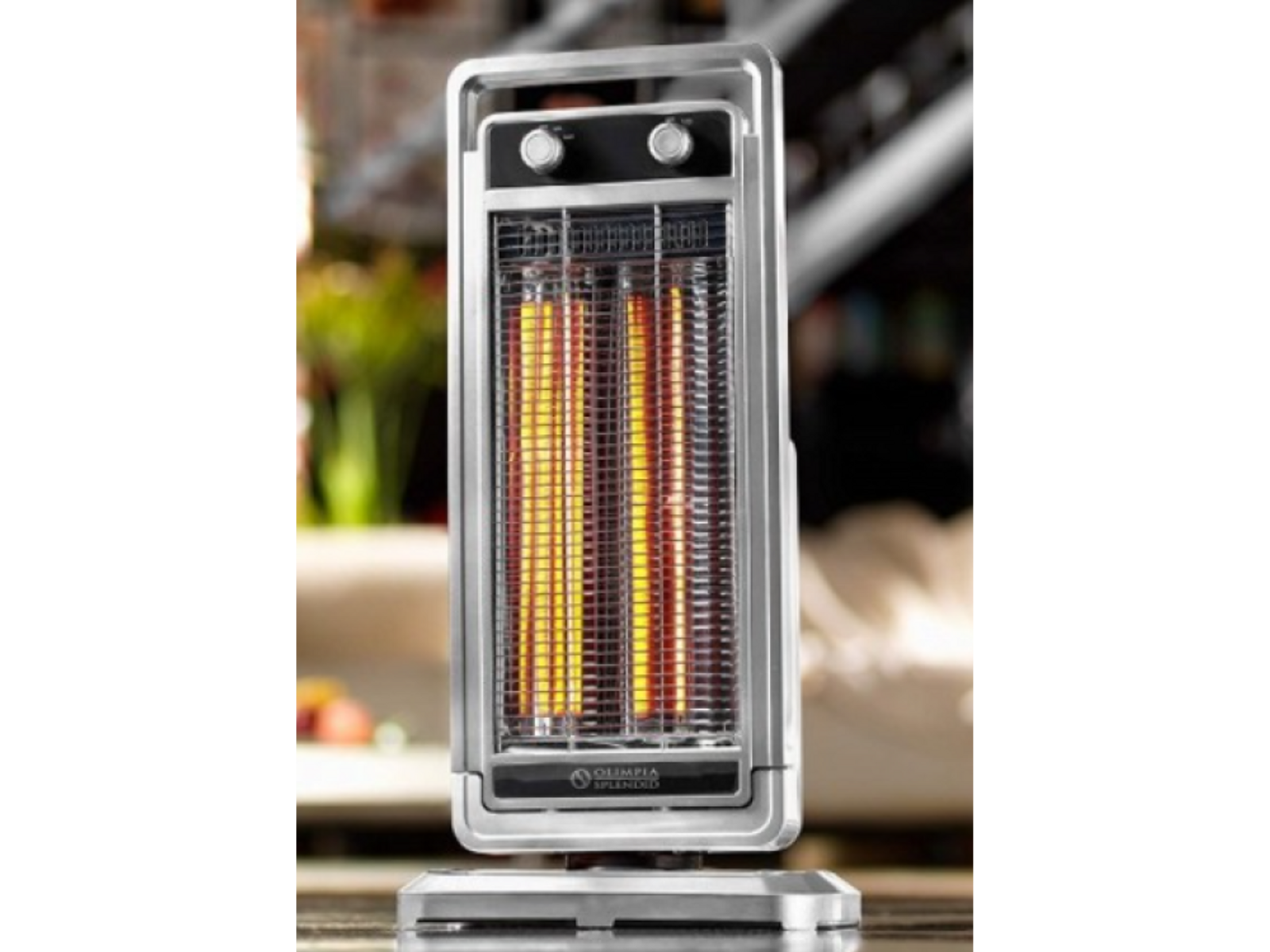 Srebrny grzejnik elektryczny z trzema świecącymi elementami grzejnymi i pokrętłami sterowania.