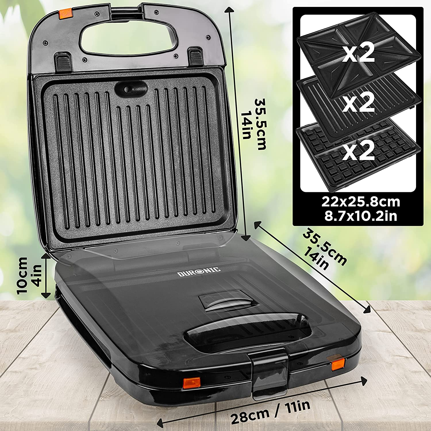 Schwarzer Sandwichmaker, offen, mit Abmessungen und austauschbaren Platten für verschiedene Formen.