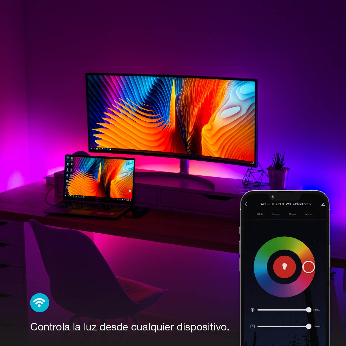 Configuración de hogar inteligente con tiras LED, monitor, portátil y teléfono inteligente.