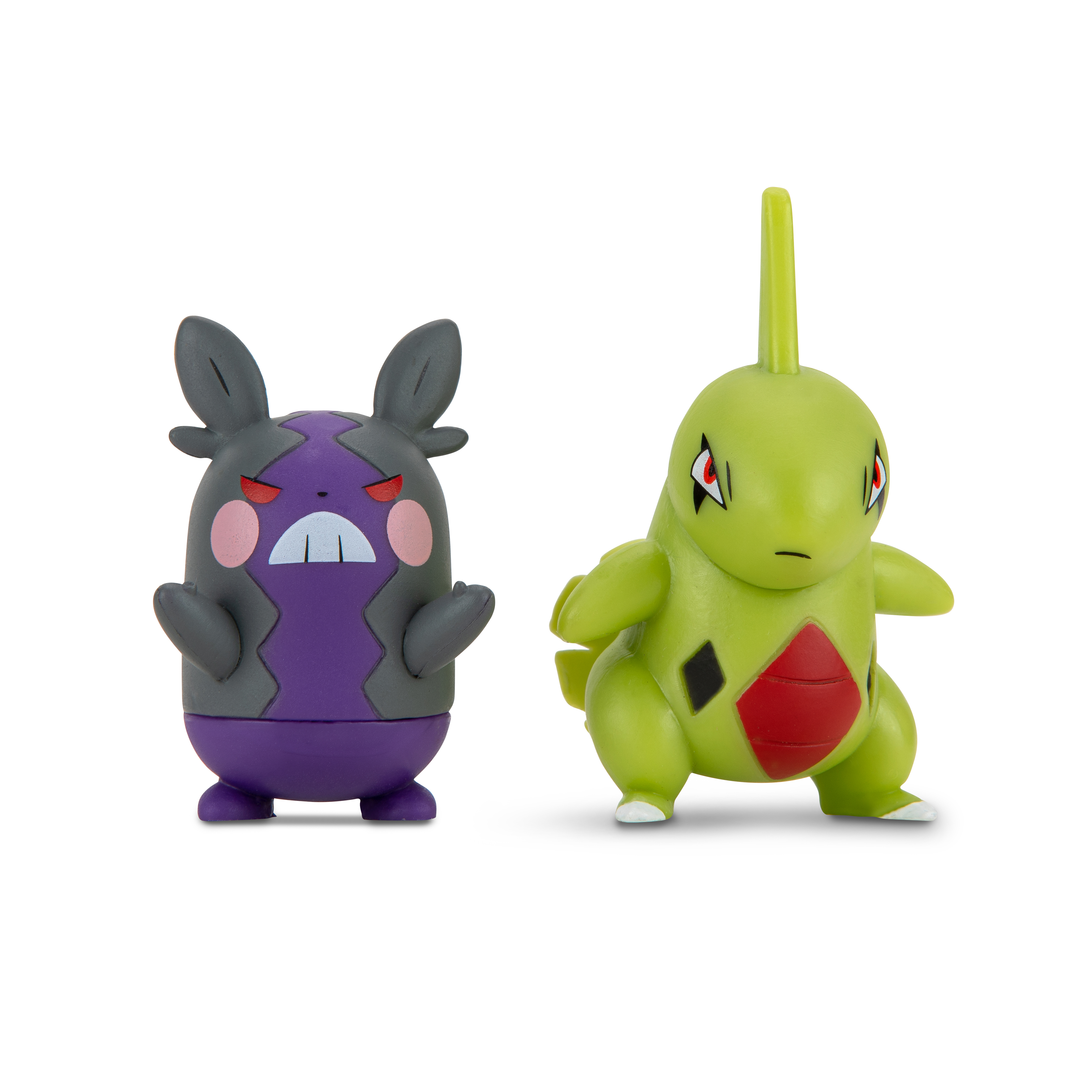 Zwei Pokémon-Figuren: eine lila-schwarze mit grimmigem Gesicht und eine grüne mit rotem Bauch.