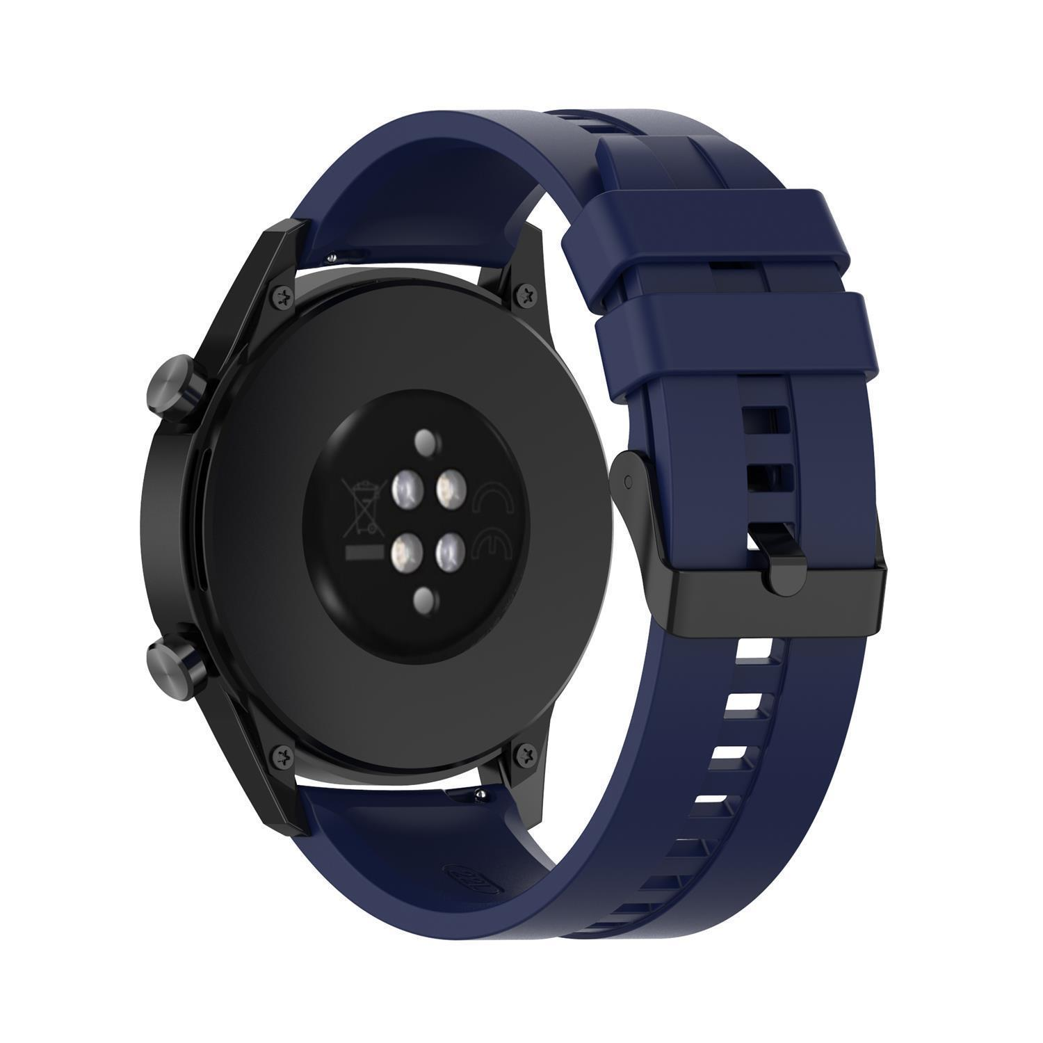 Nahaufnahme einer schwarzen Smartwatch mit blauem Armband, zeigt Rückseite und Sensoren.