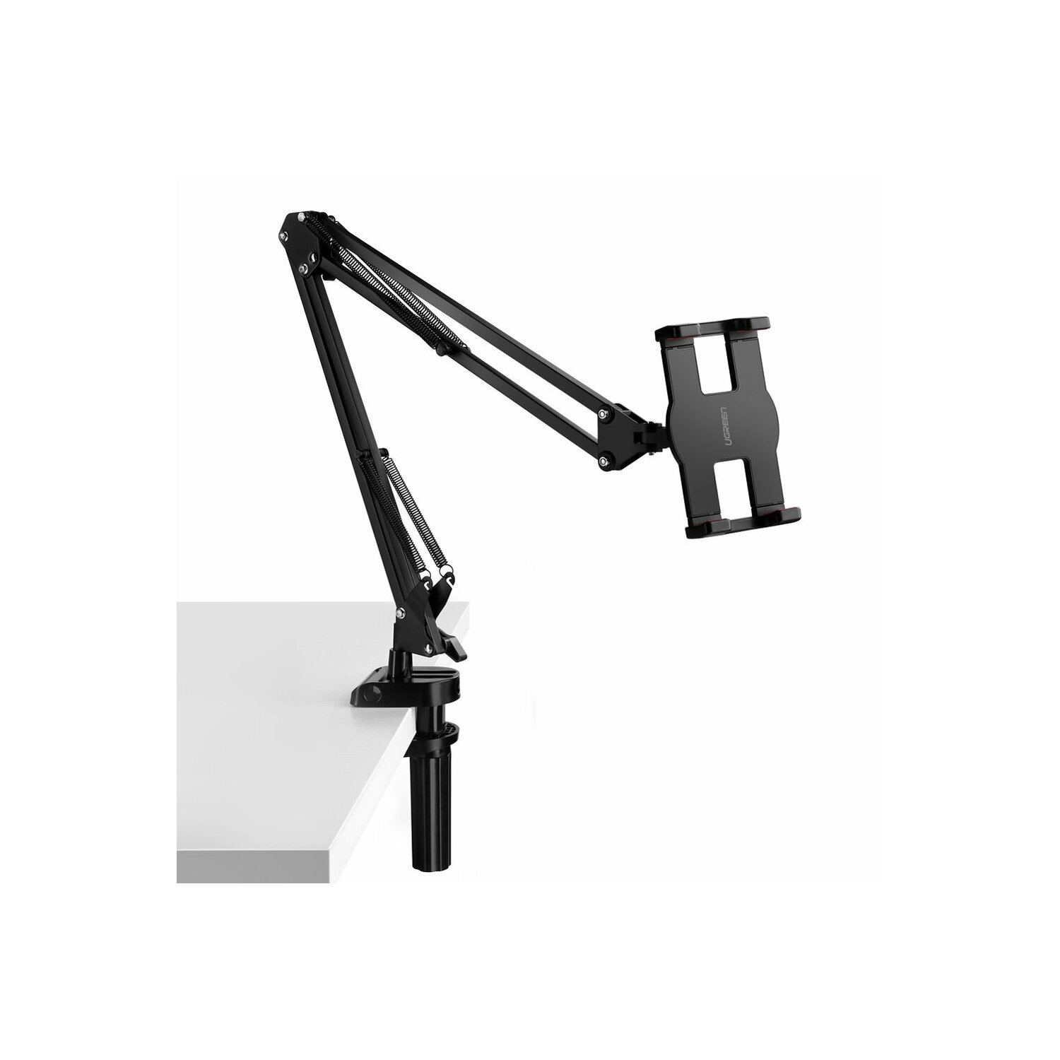 Czarny ramię uchwytu na tablet zamontowane na białym stole. Uchwyt na tablet niczego nie trzyma.